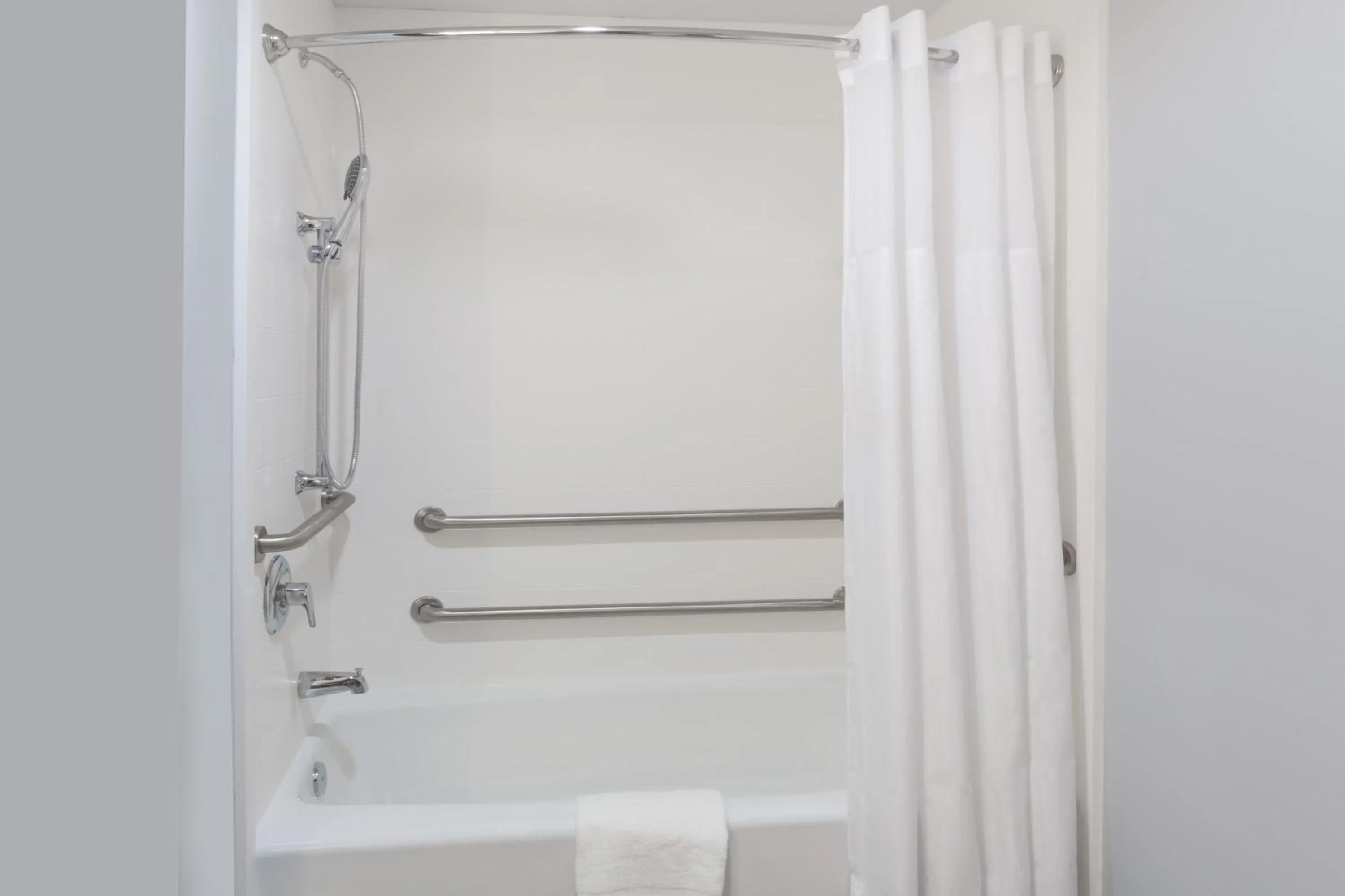 Bathroom in Days Inn & Suites by Wyndham Houston NW Cypress