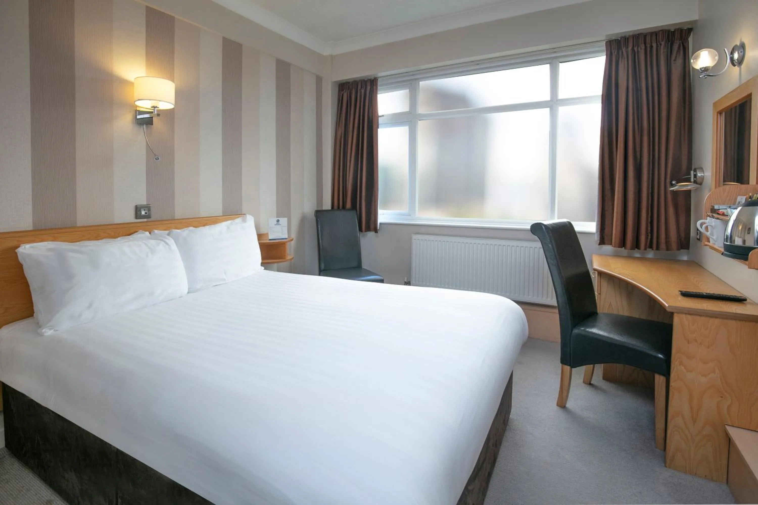 Bed in Cresta Court Hotel