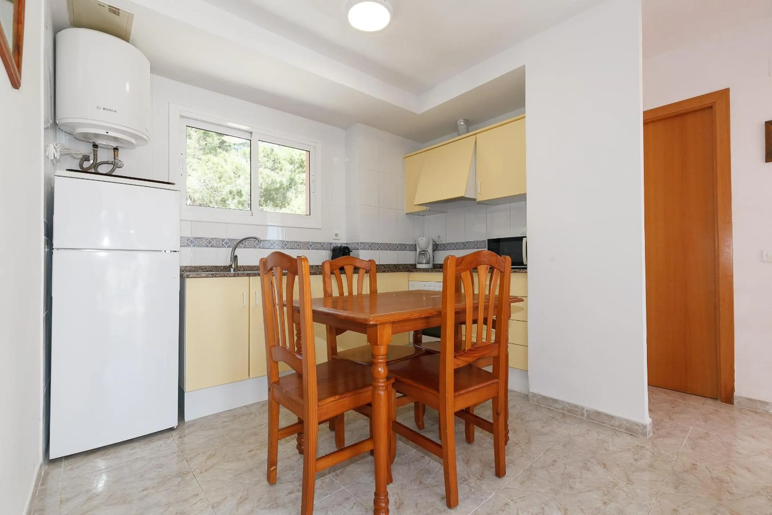 Kitchen or kitchenette in UHC Arco del Sol Family Complex