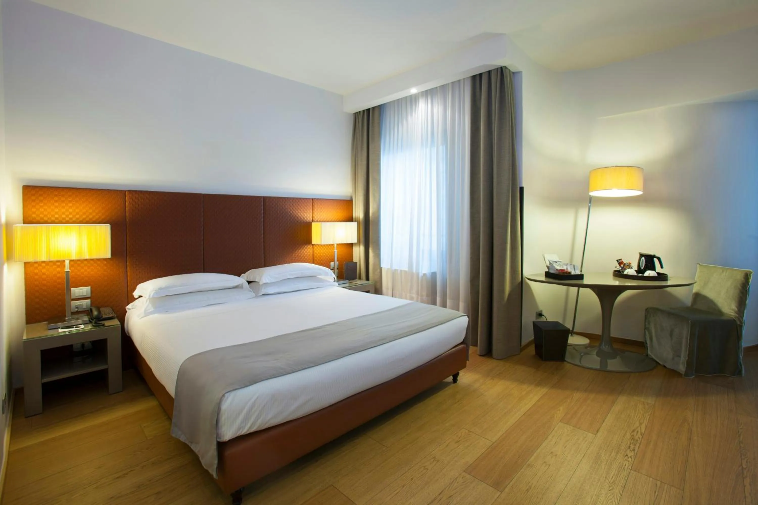 Photo of the whole room, Bed in Starhotels Michelangelo Florence