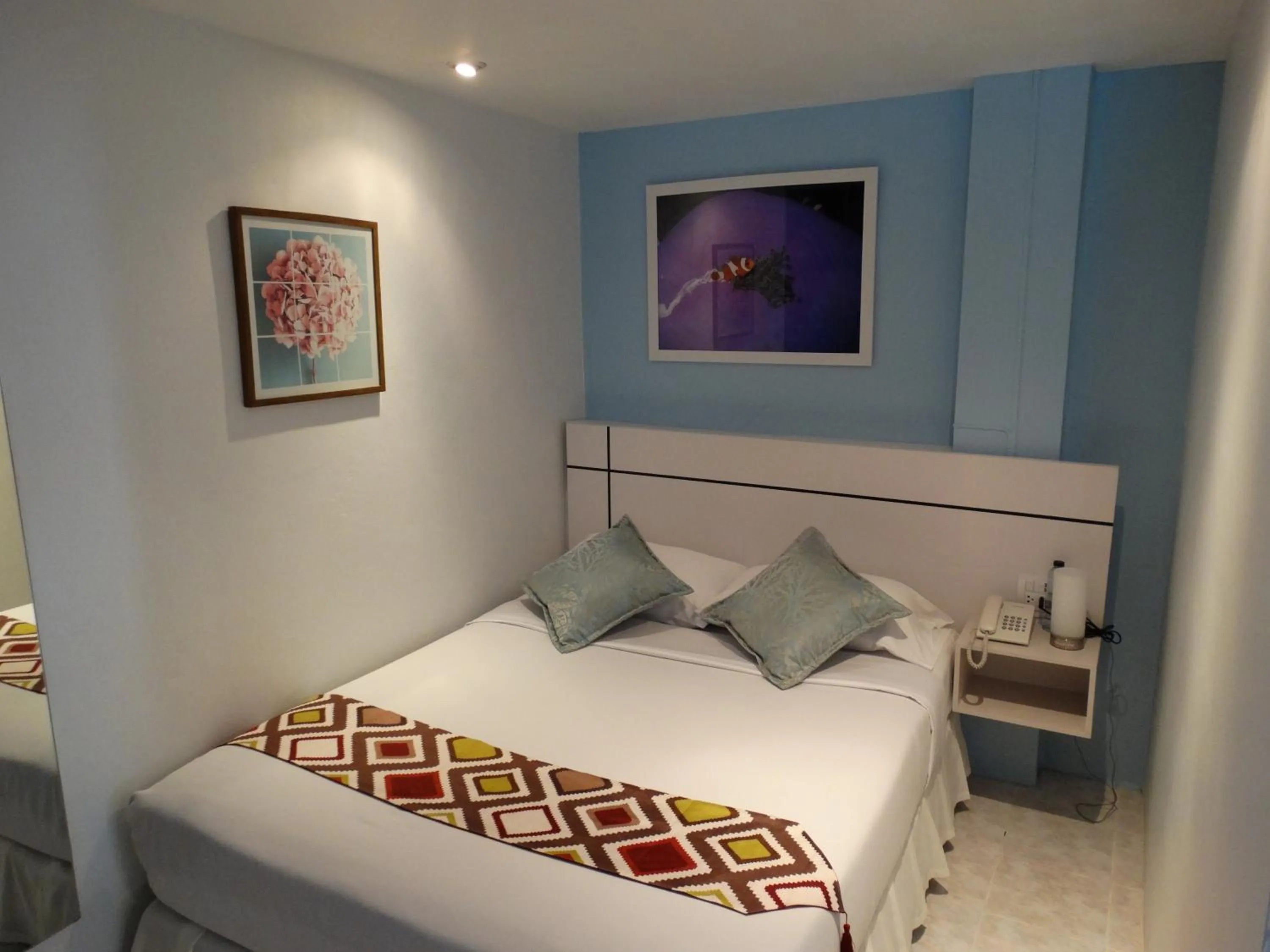 Bed in Summer Breeze Hotel