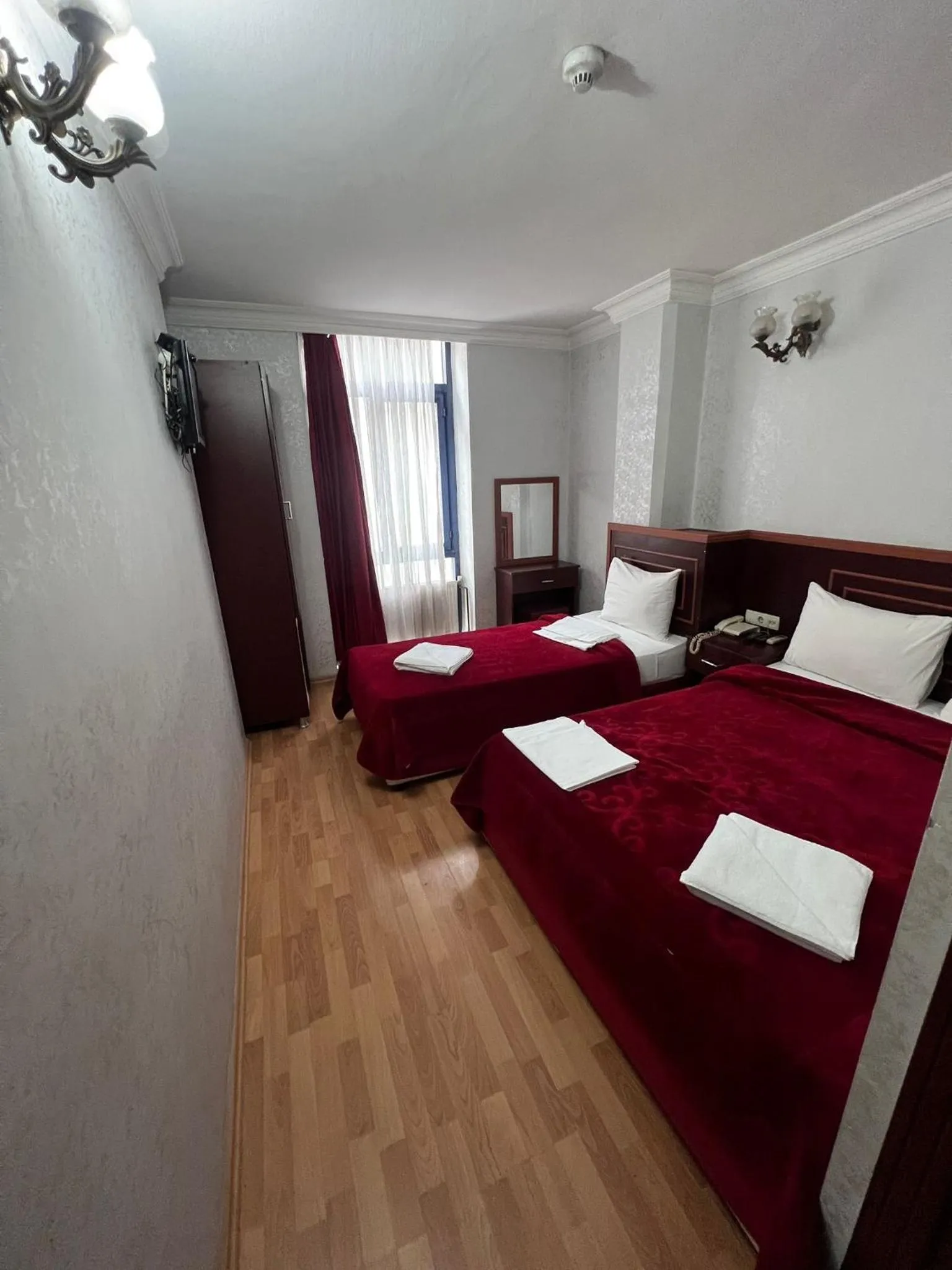 Bed in Red White Hotel