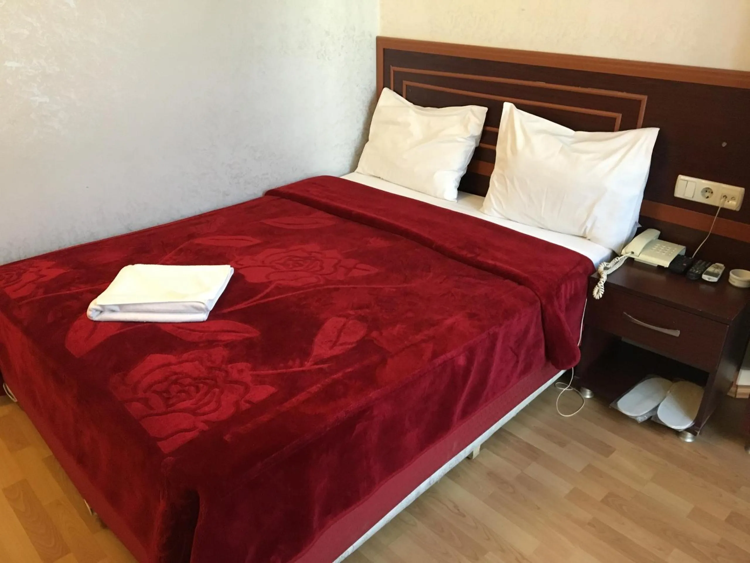 Bed in Red White Hotel