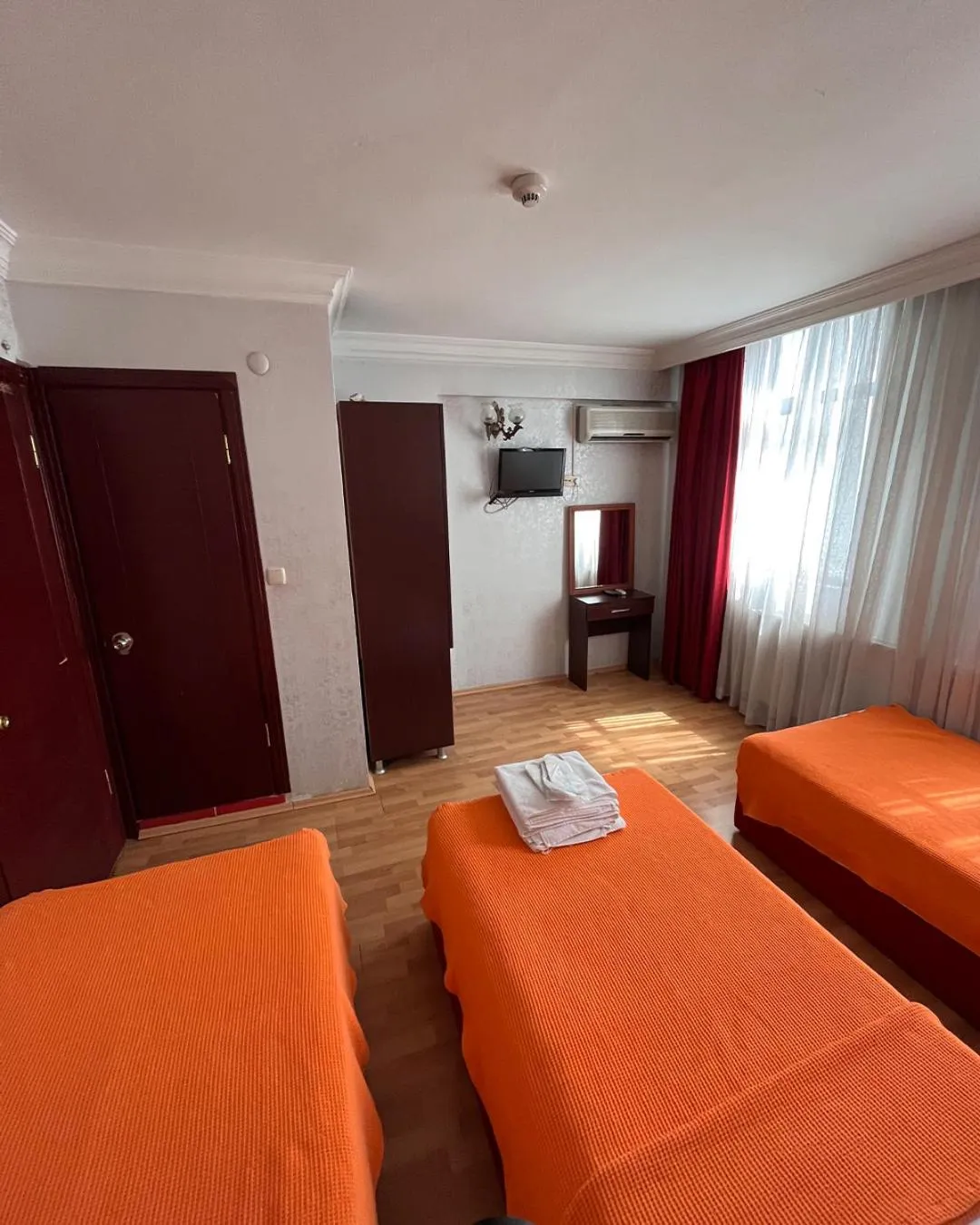 Photo of the whole room, Bed in Red White Hotel