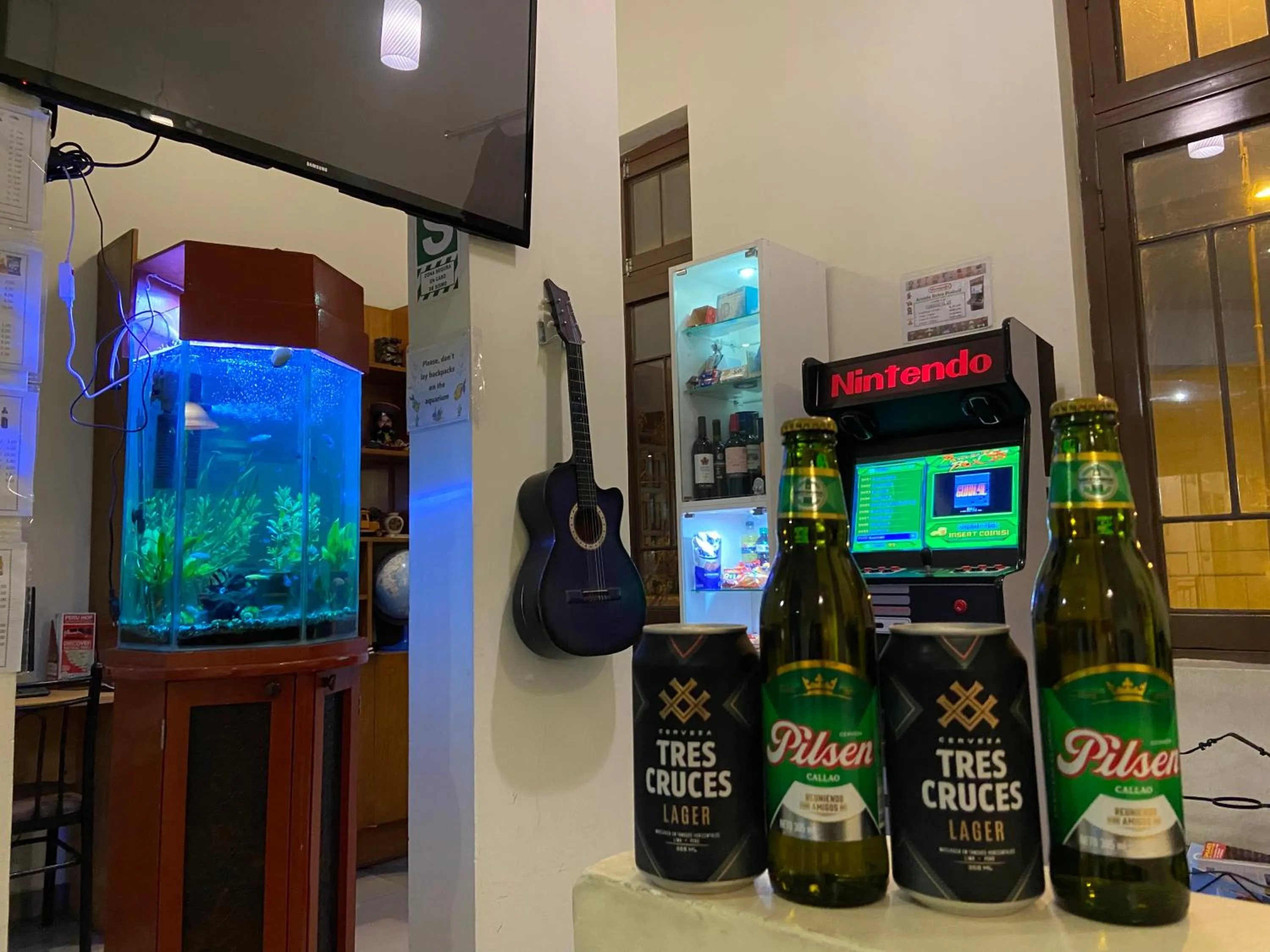 Communal lounge/ TV room in Lima House Hostel