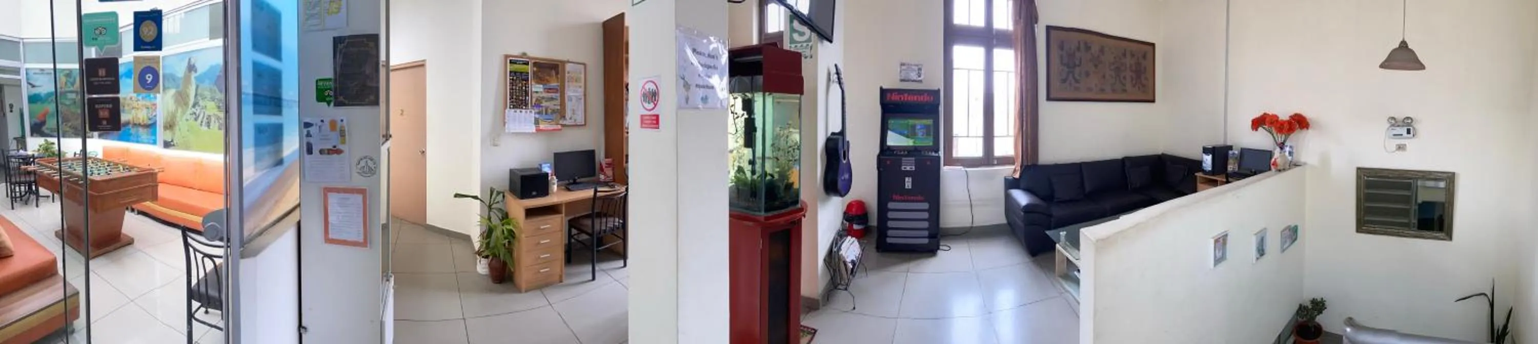 Communal lounge/ TV room in Lima House Hostel