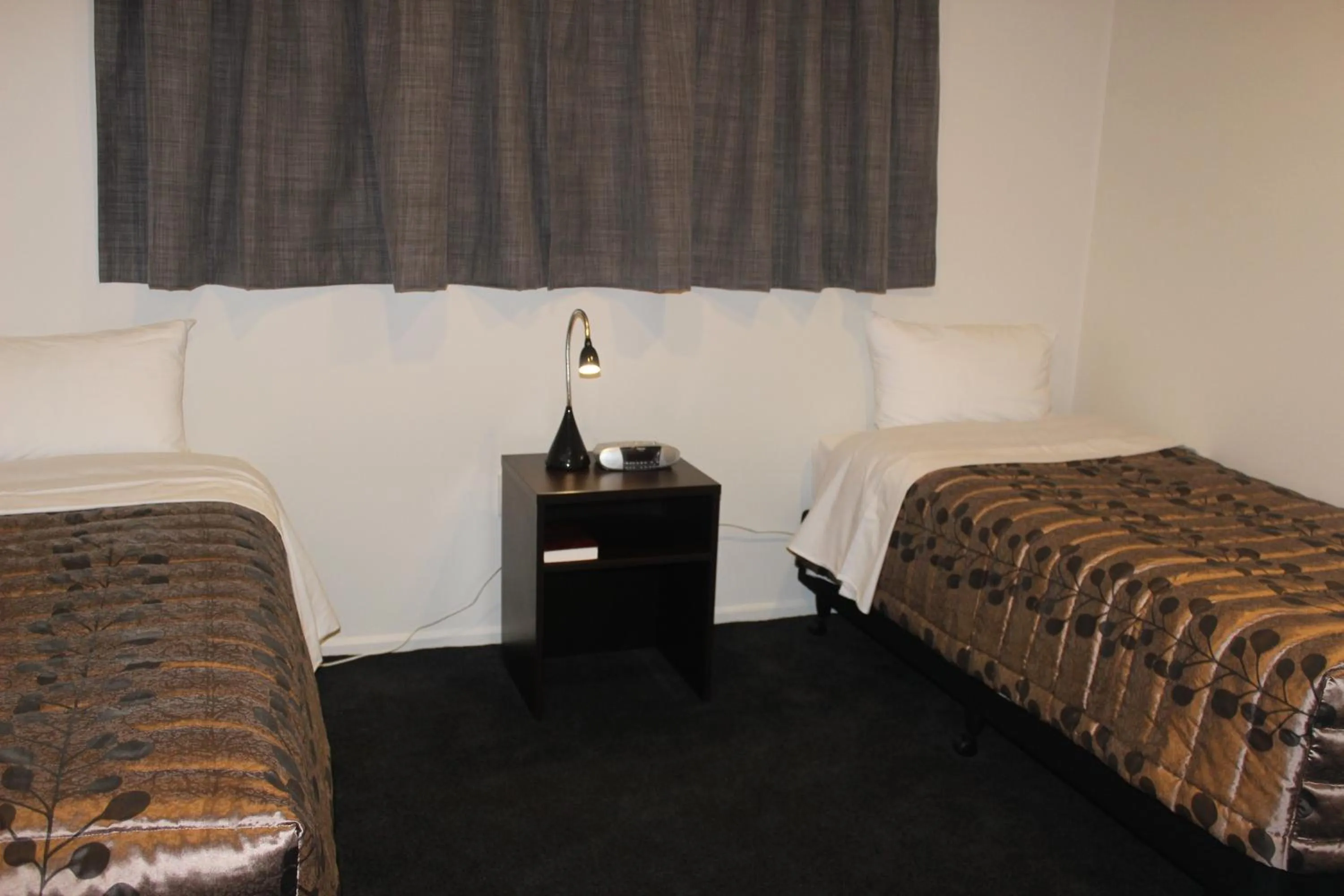 Bed in Riverlea Motel