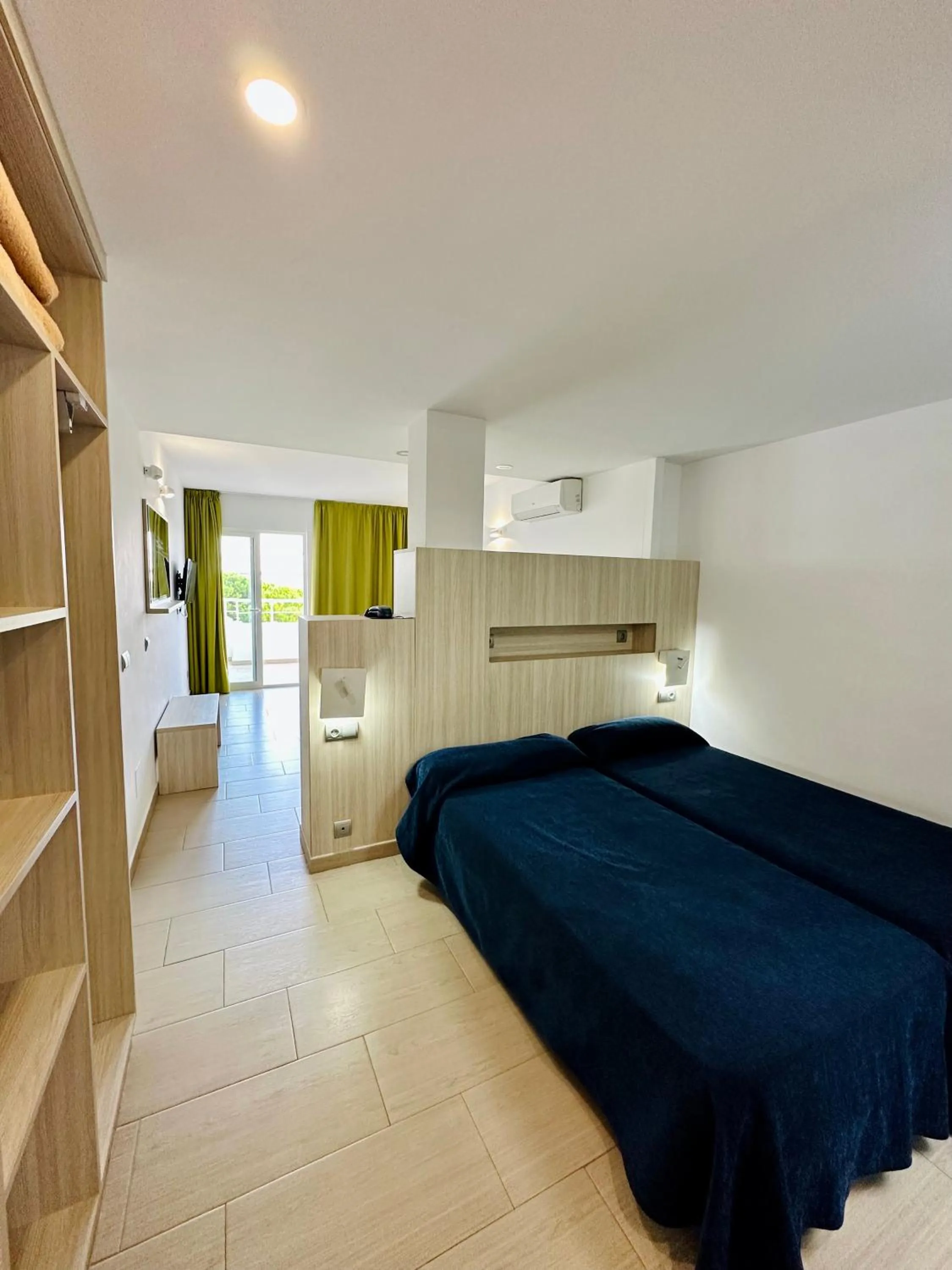 Bed in Apartamentos Jet - Adults Only