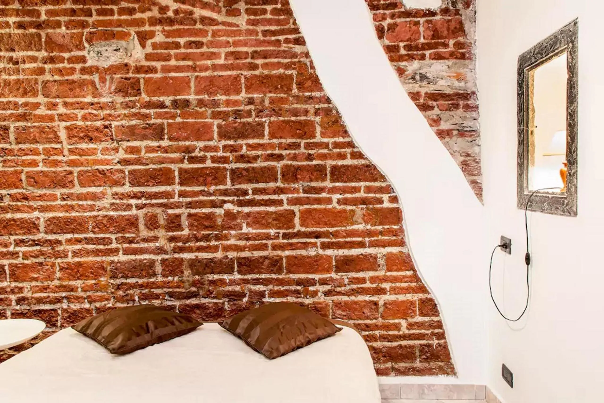 Decorative detail, Bed in Garibaldi Apartment - Red lights district