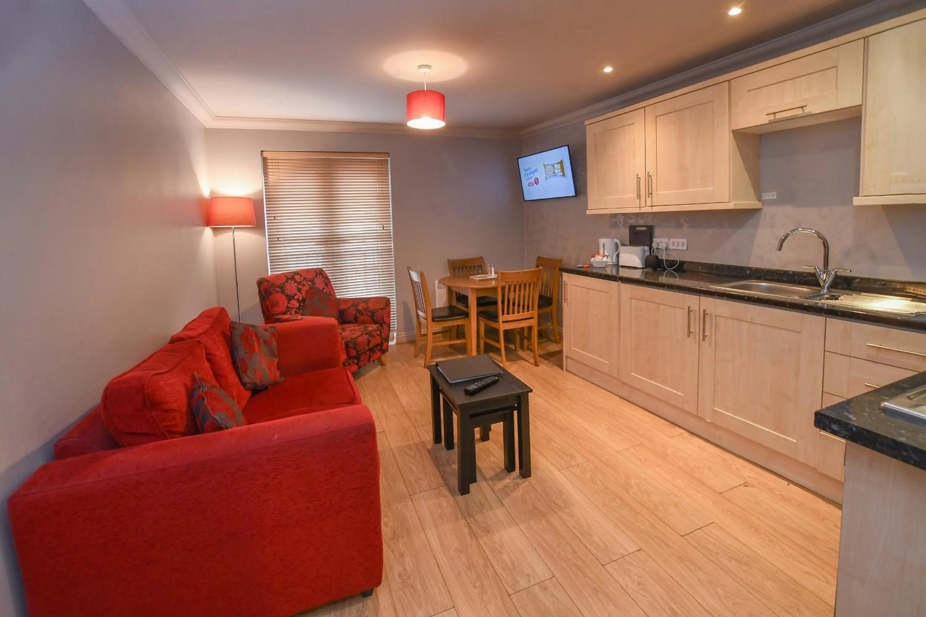 Kitchen or kitchenette in The Queens Hotel & Victoria Cloisters Apartments