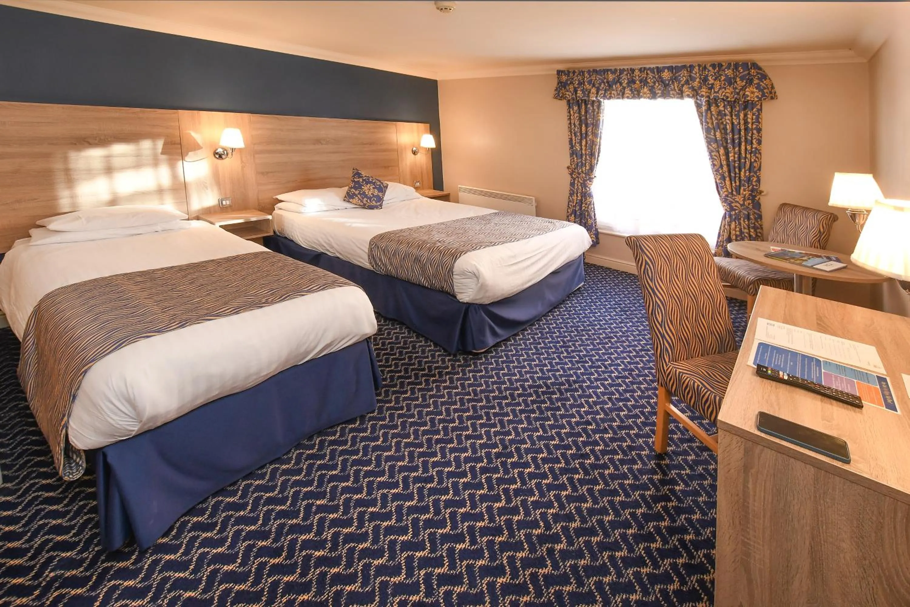 Bed in The Queens Hotel & Victoria Cloisters Apartments