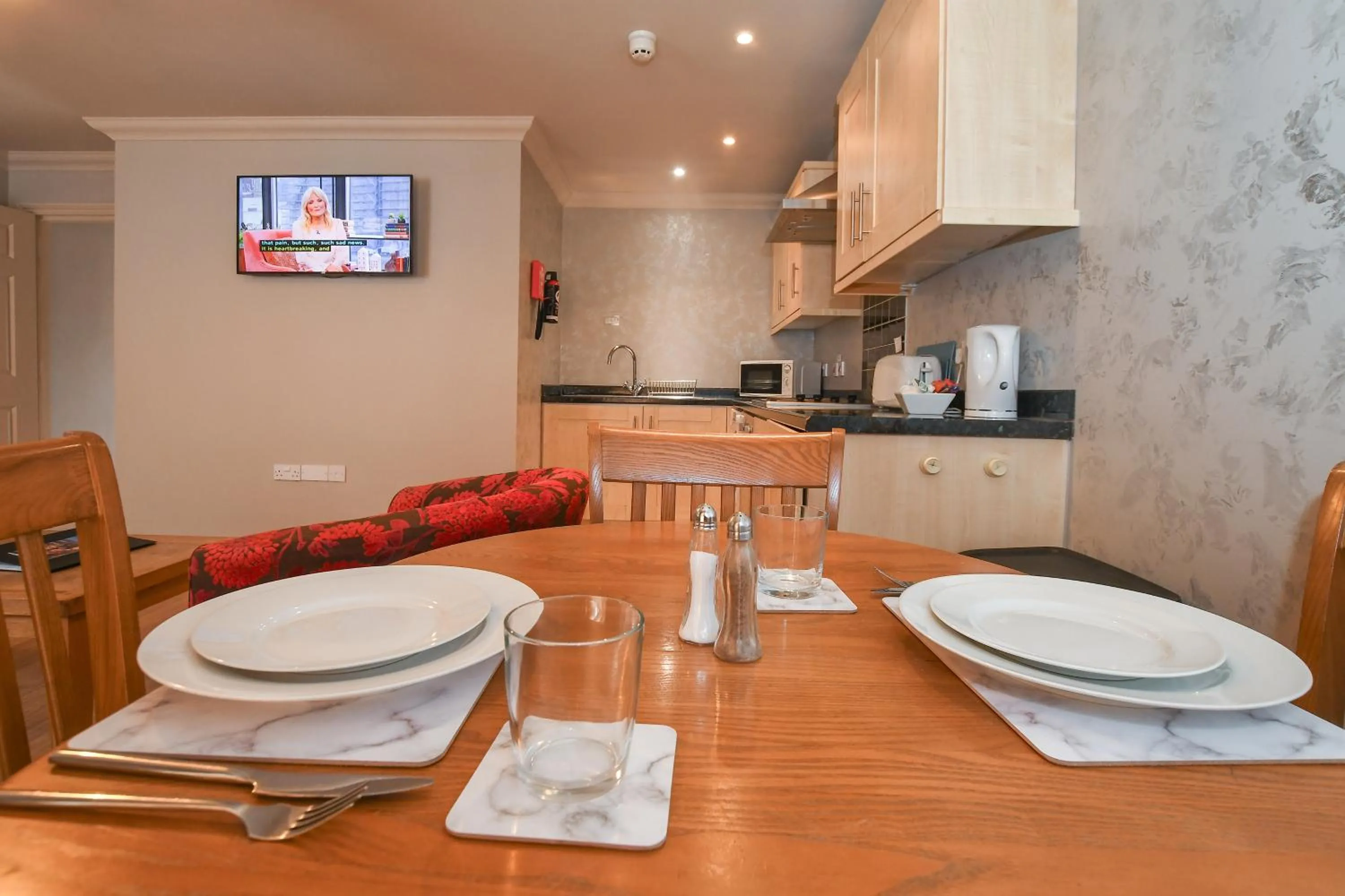 Kitchen or kitchenette in The Queens Hotel & Victoria Cloisters Apartments