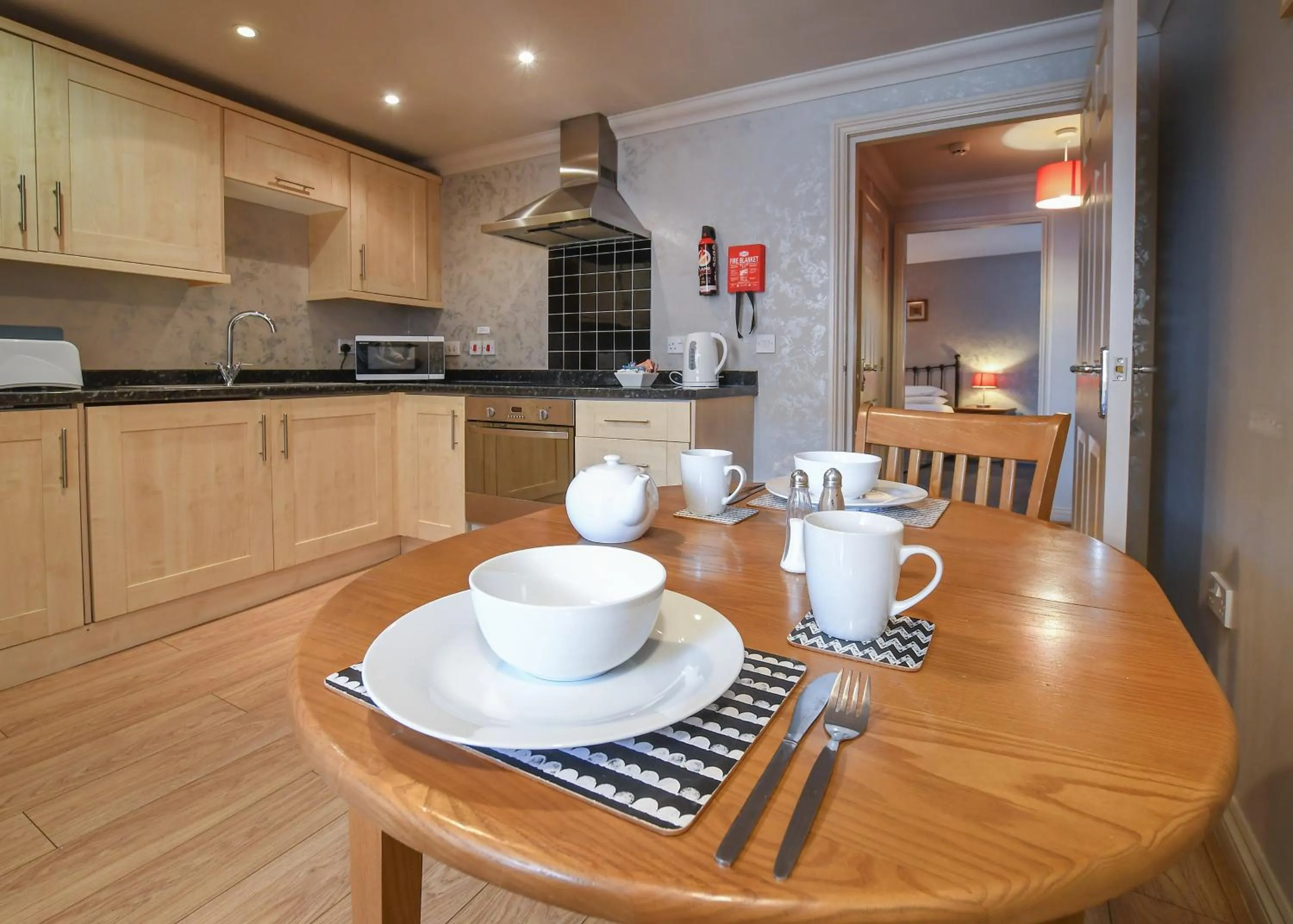 Kitchen or kitchenette in The Queens Hotel & Victoria Cloisters Apartments