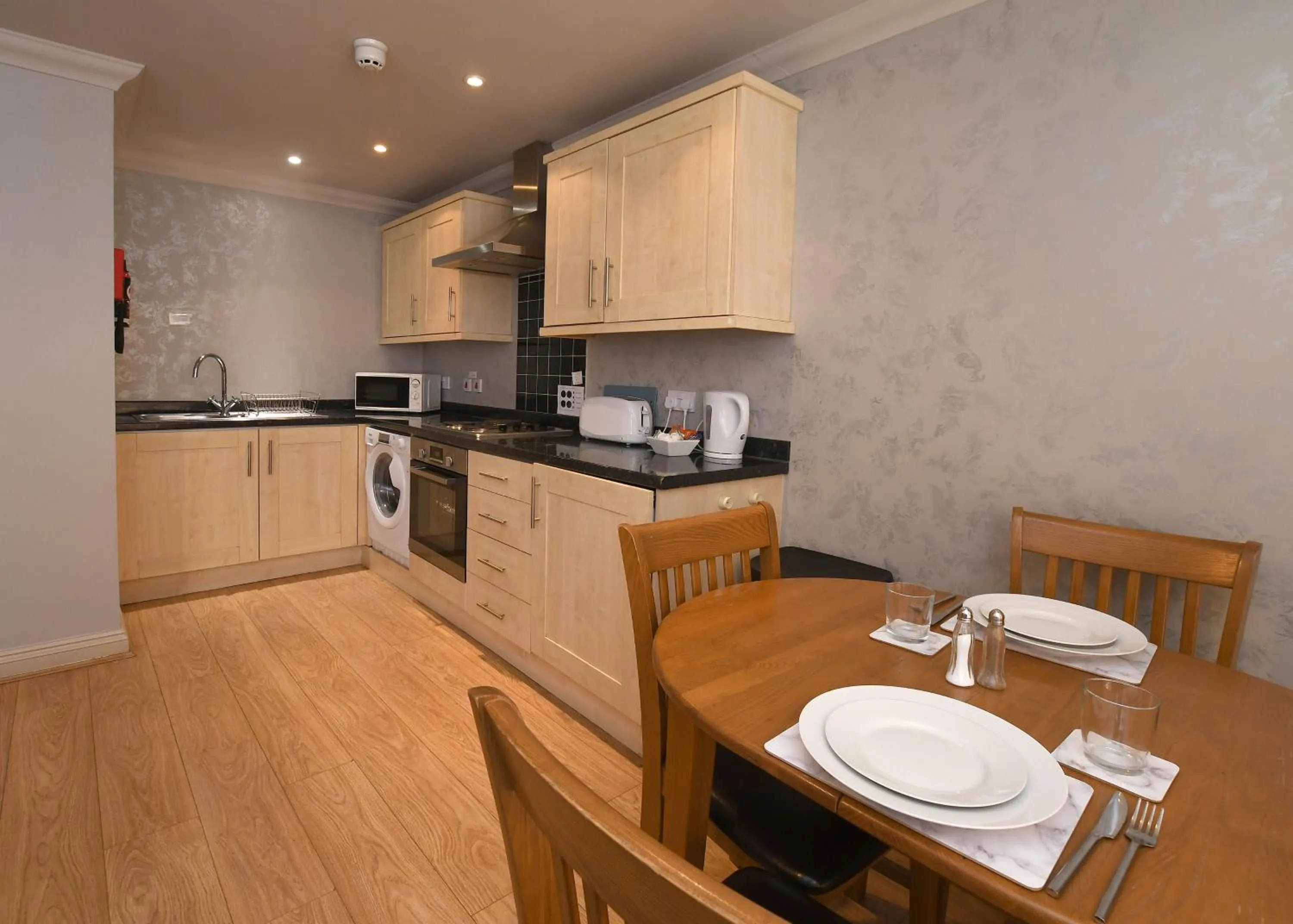 Kitchen or kitchenette in The Queens Hotel & Victoria Cloisters Apartments