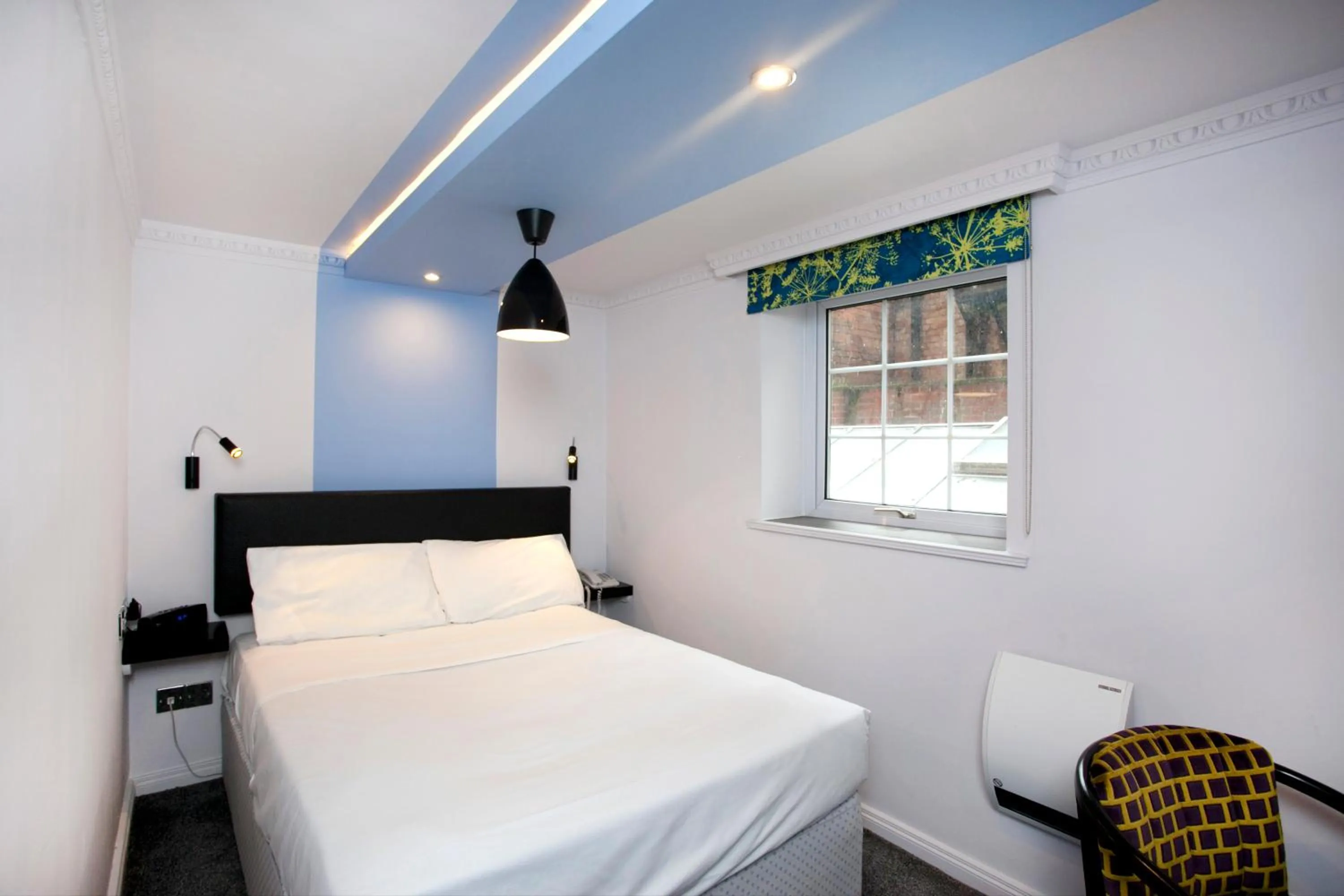 Photo of the whole room, Bed in St James Hotel; BW Premier Collection