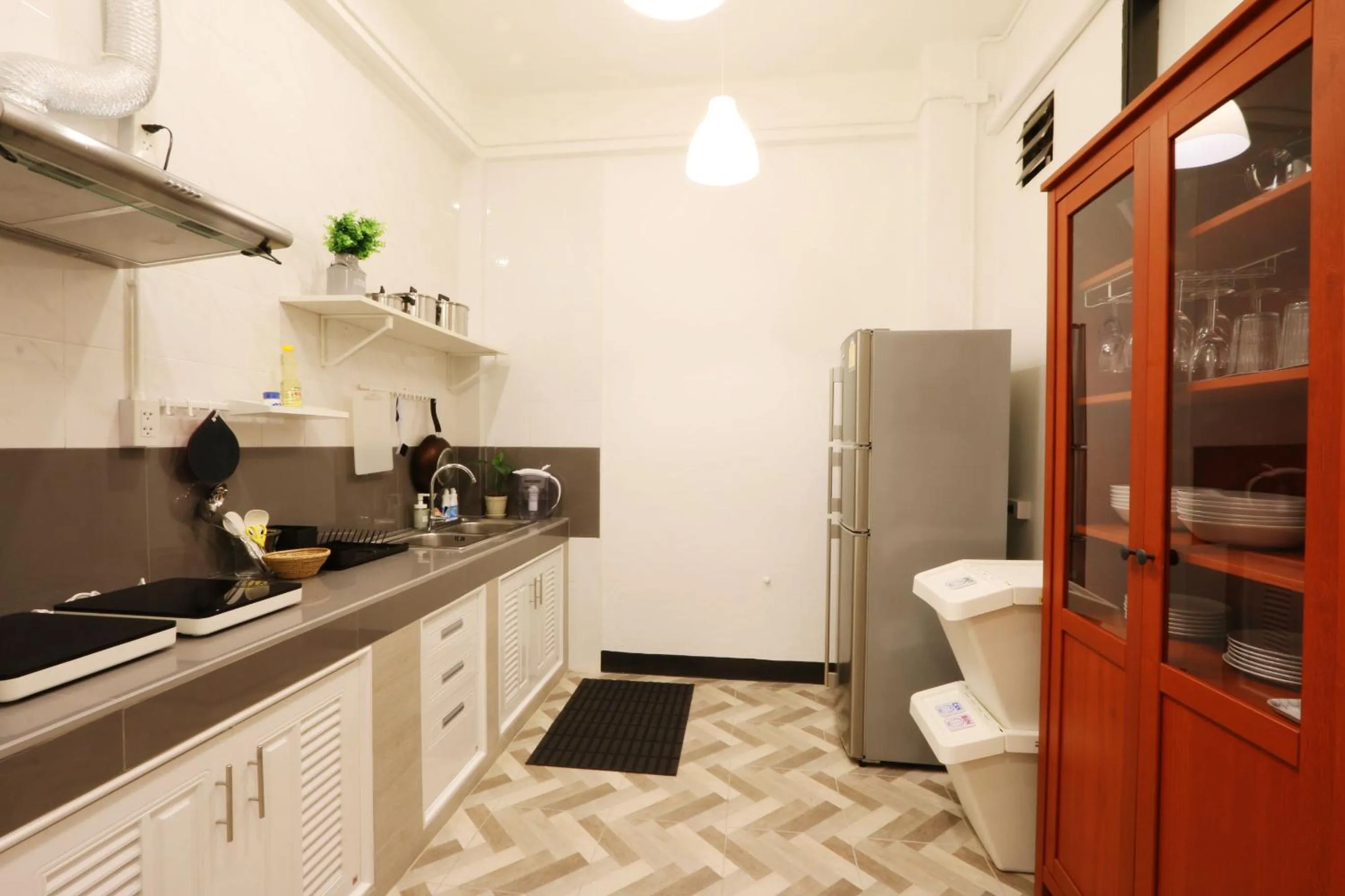 Kitchen or kitchenette in Neveu Premier Residence : Ratchada