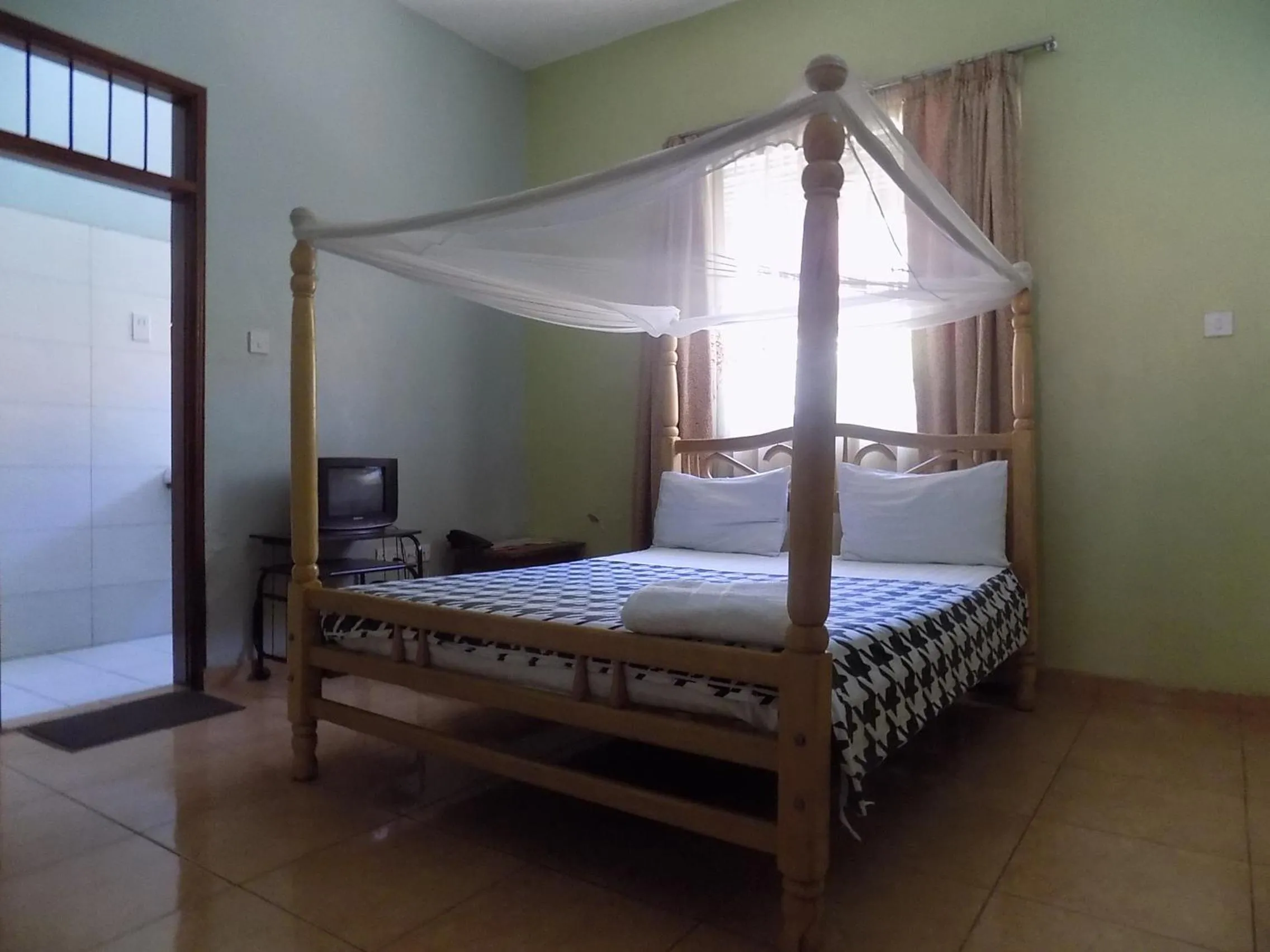 Bed in Etana Motel Kampala