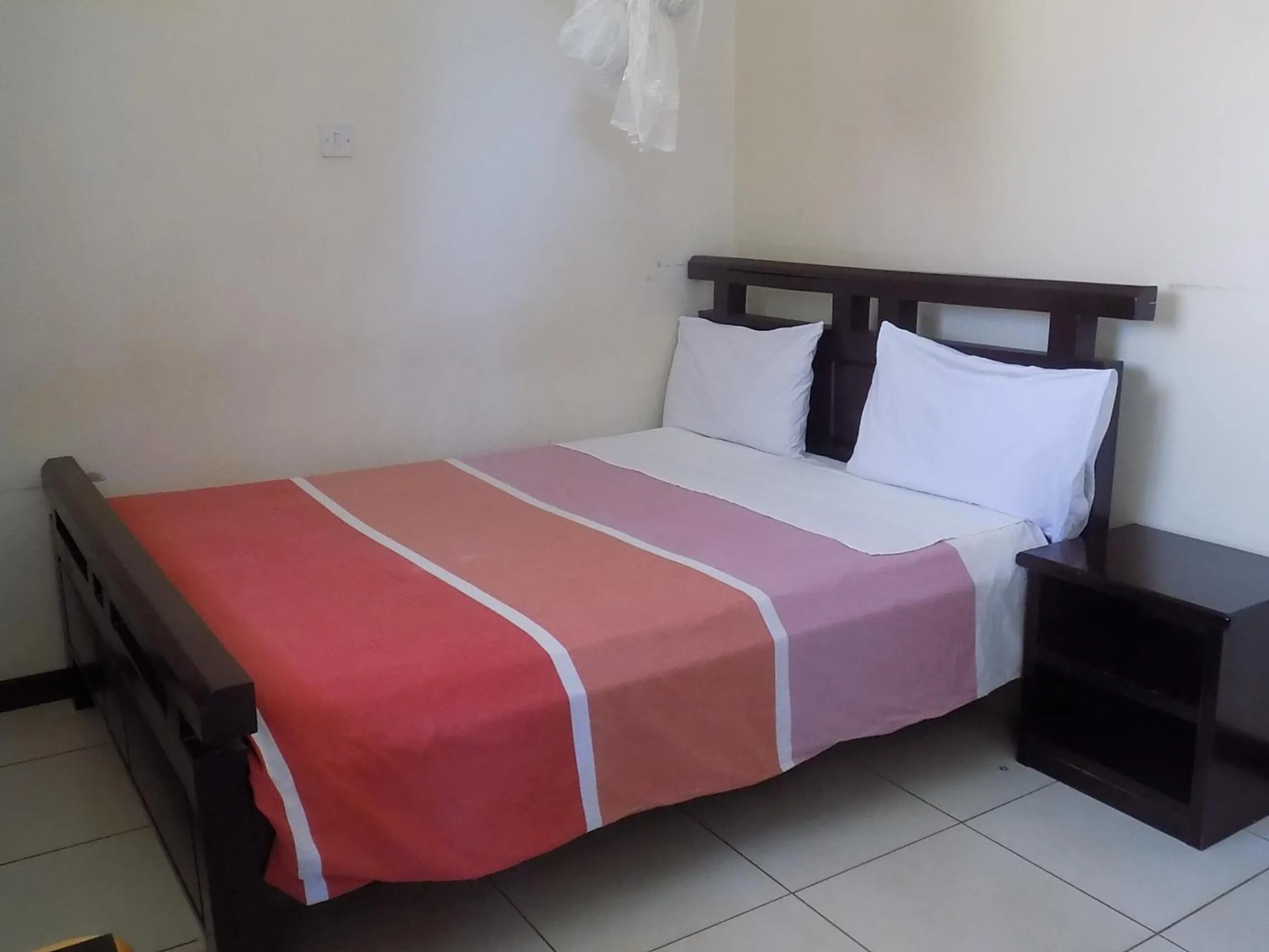 Bed in Etana Motel Kampala