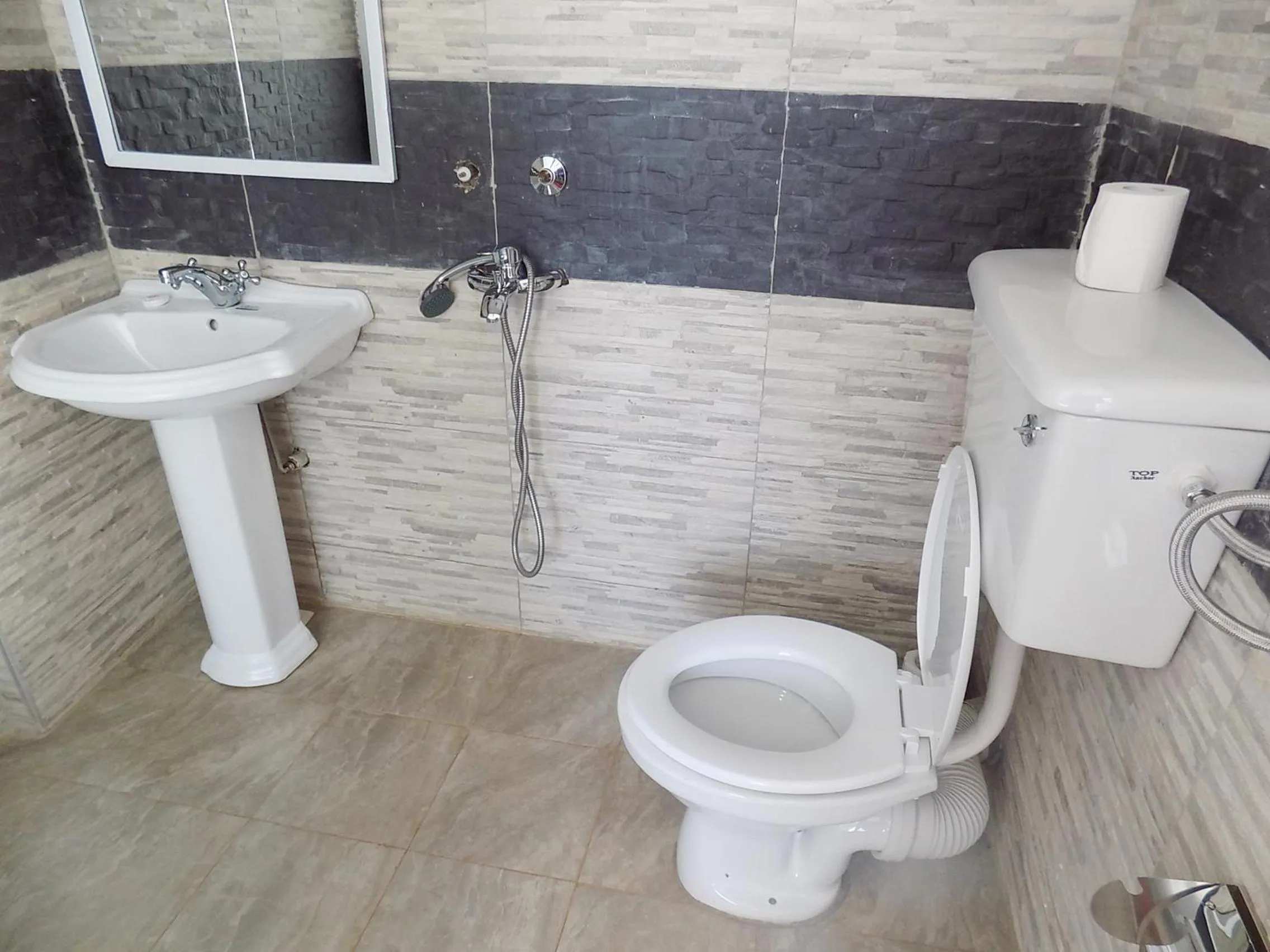 Bathroom in Remmings Hotel Kampala