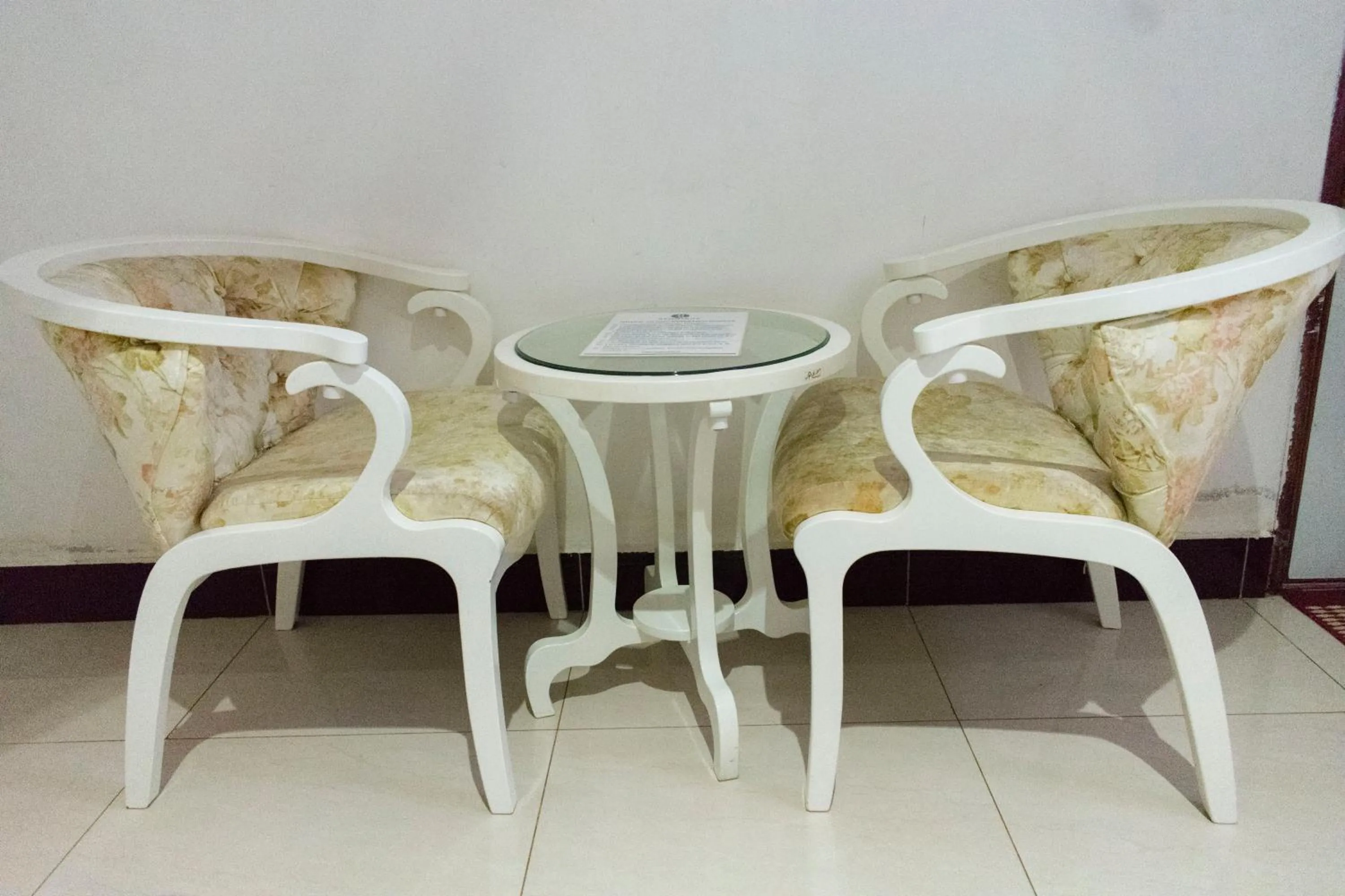 Seating area in Remmings Hotel Kampala