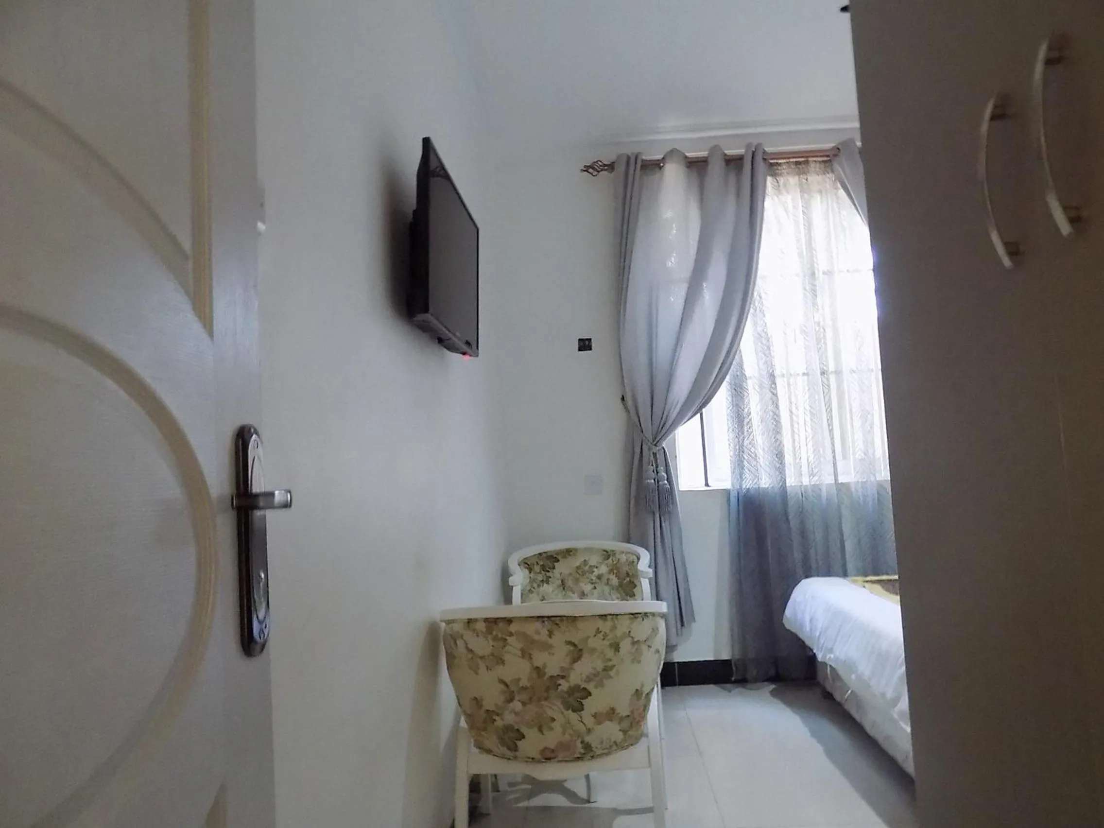 Bedroom in Remmings Hotel Kampala