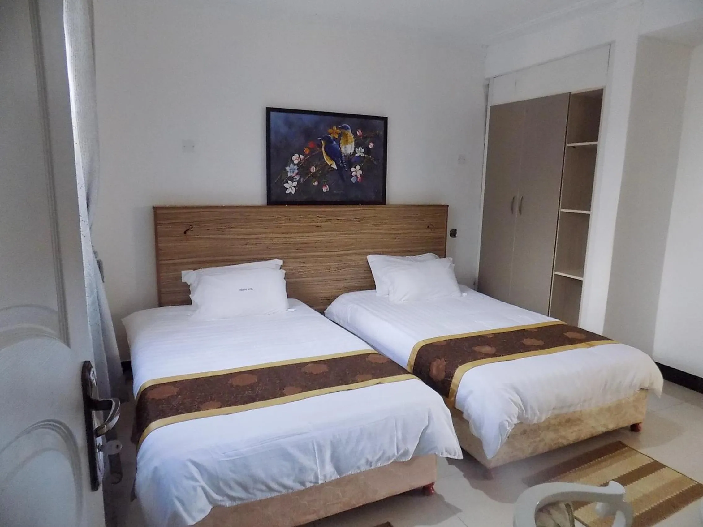 Bedroom in Remmings Hotel Kampala