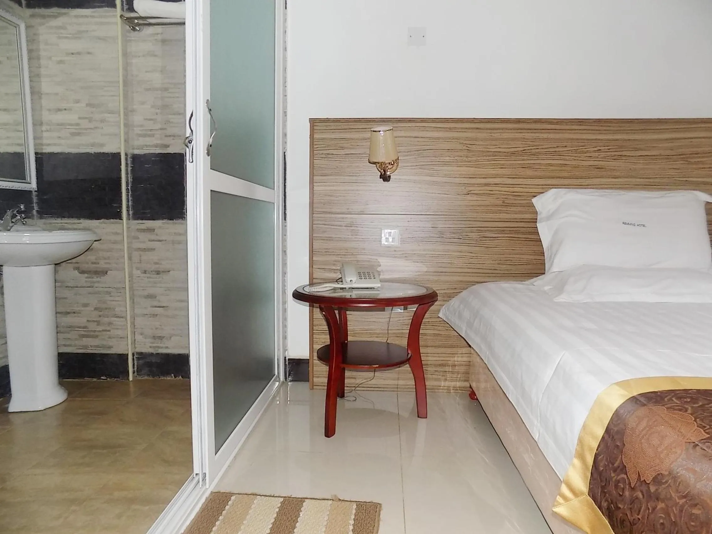 Bathroom in Remmings Hotel Kampala