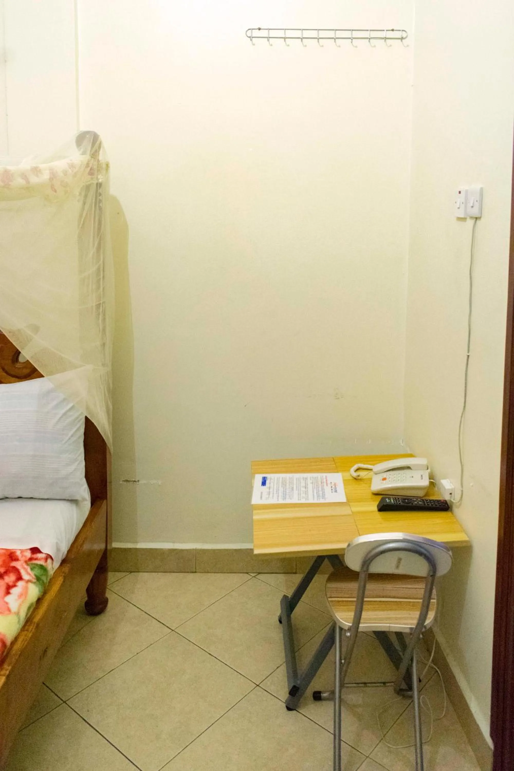 Bed in Japs Motel Mbarara