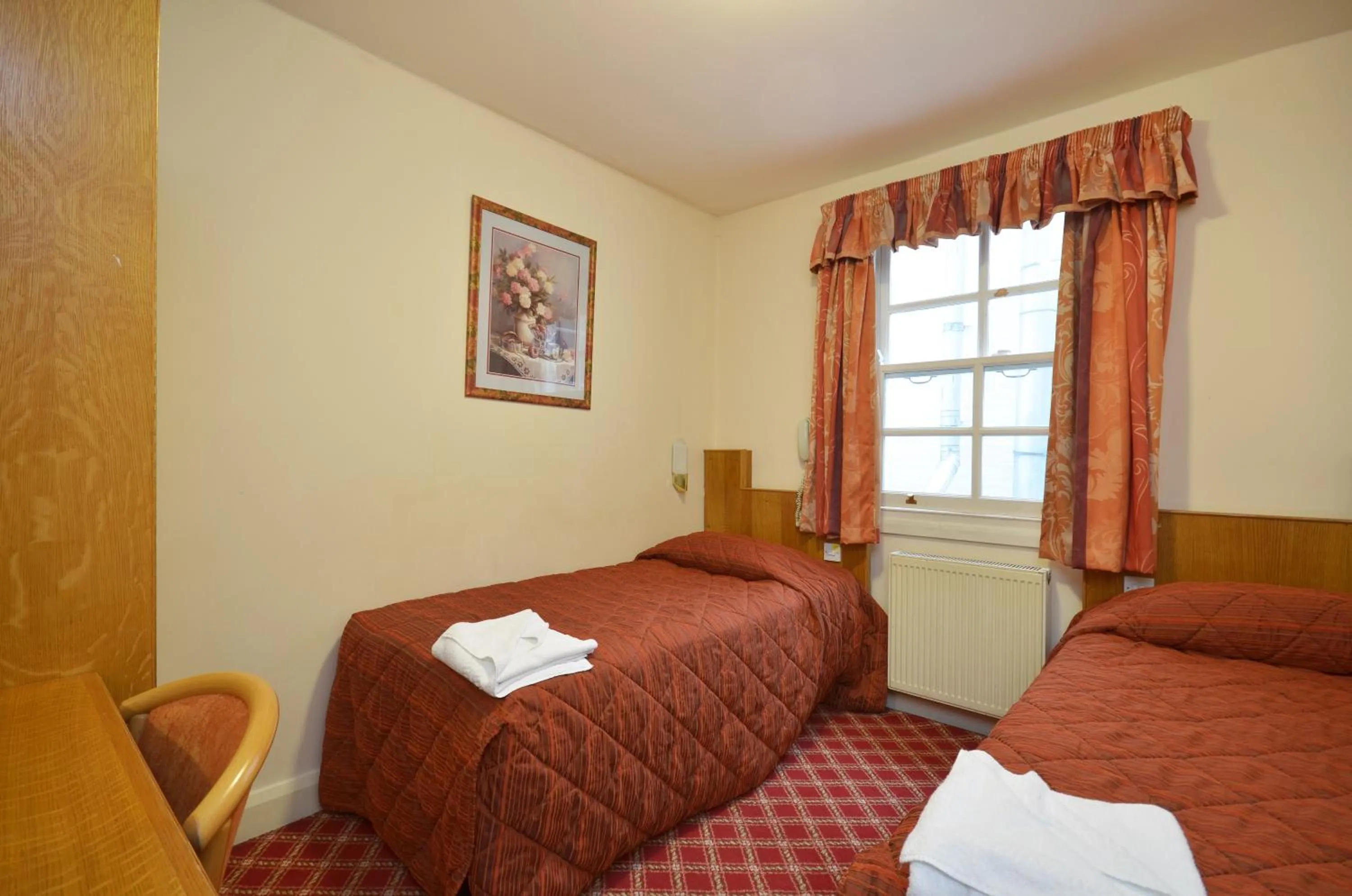 Bed in Seymour Hotel