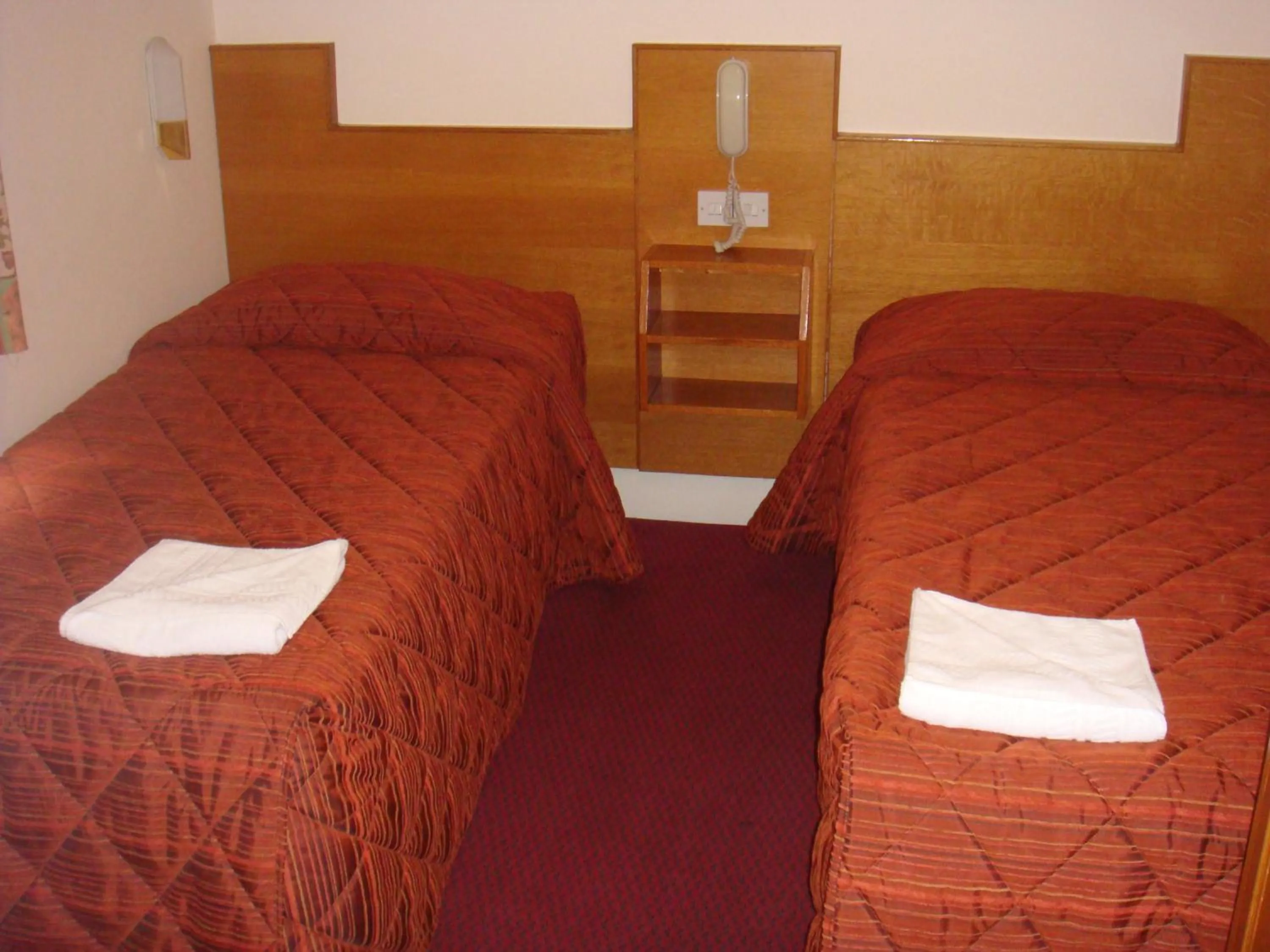 Bed in Seymour Hotel