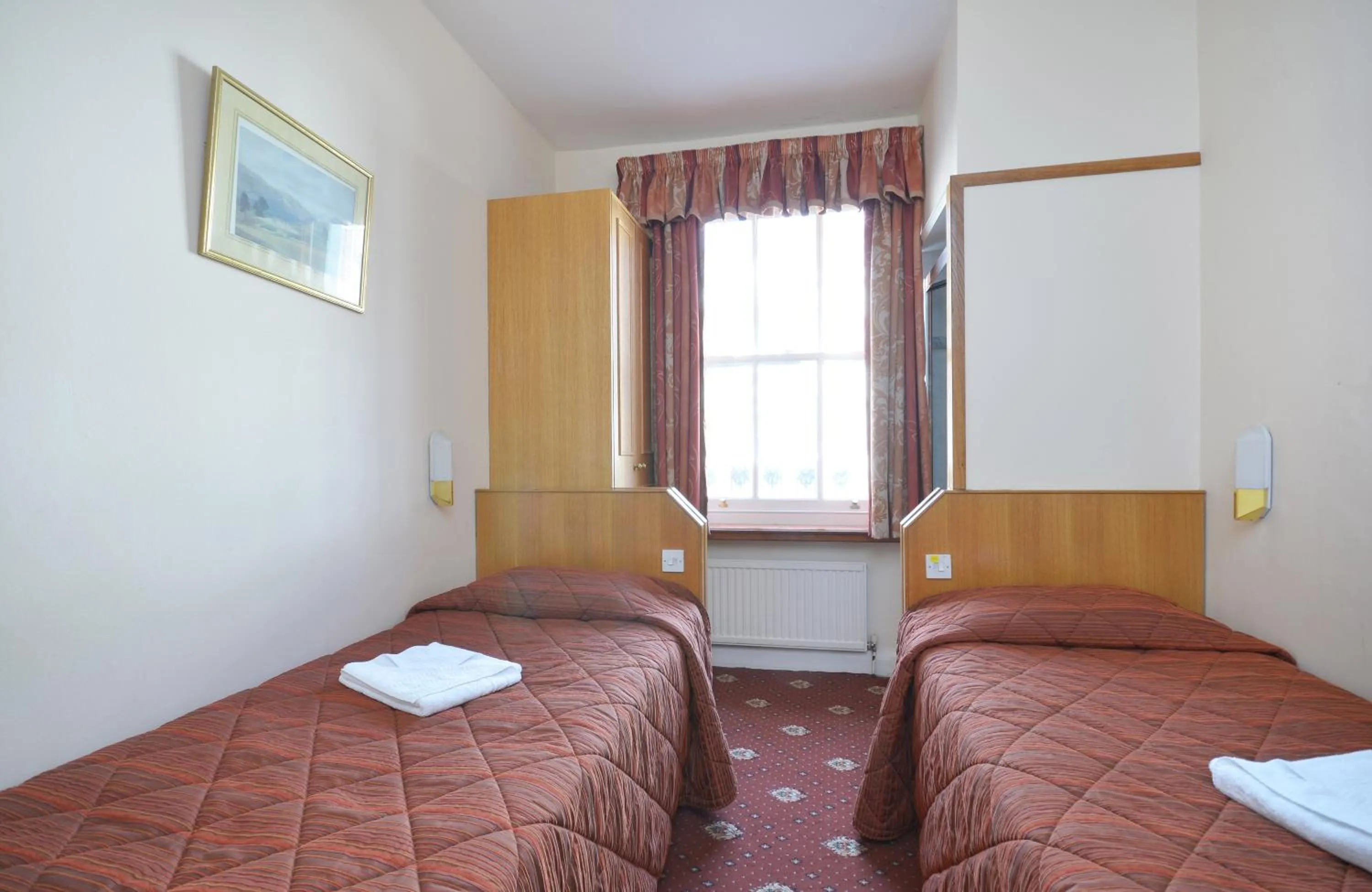 Bed in Seymour Hotel