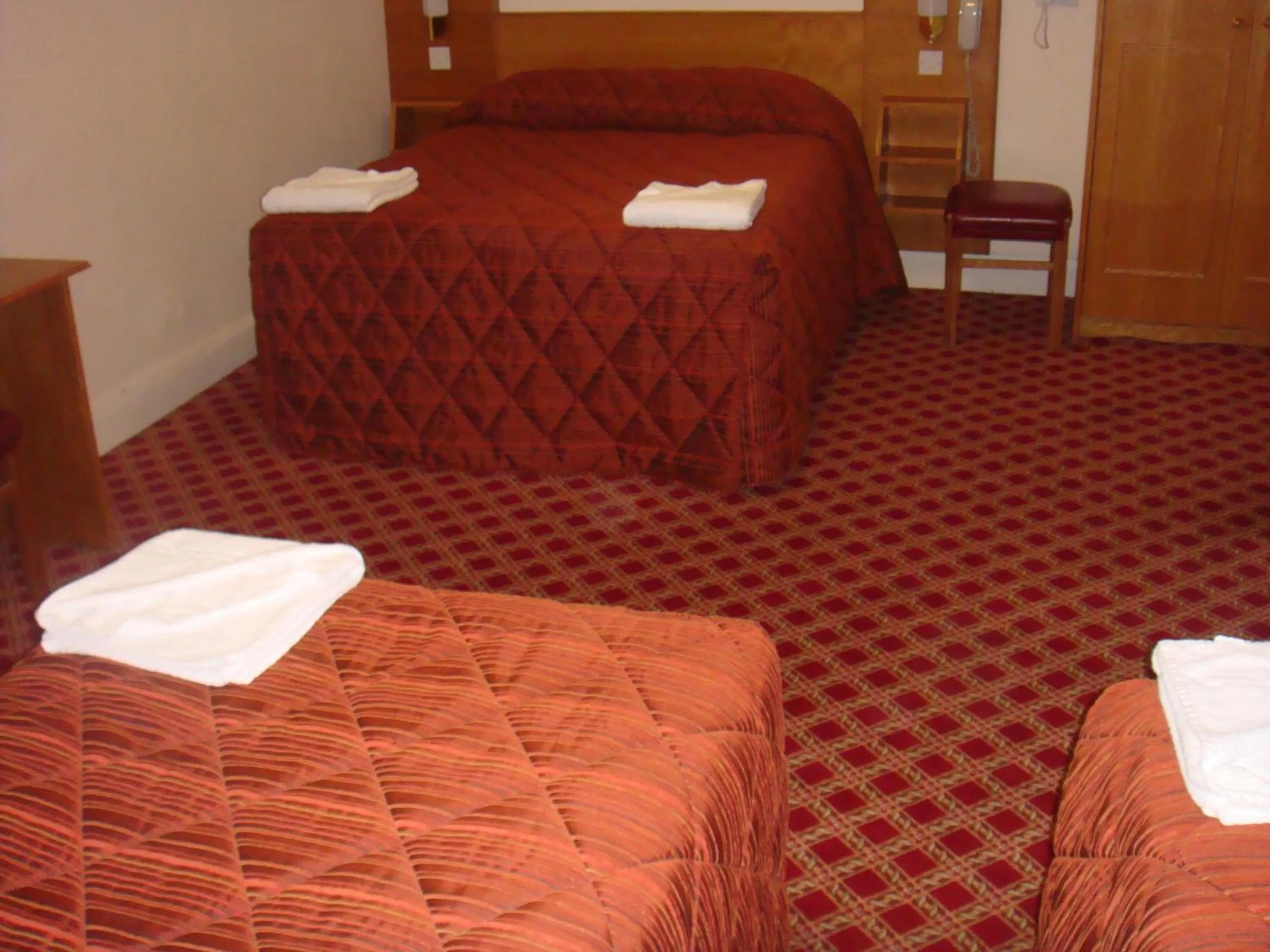 Bed in Seymour Hotel