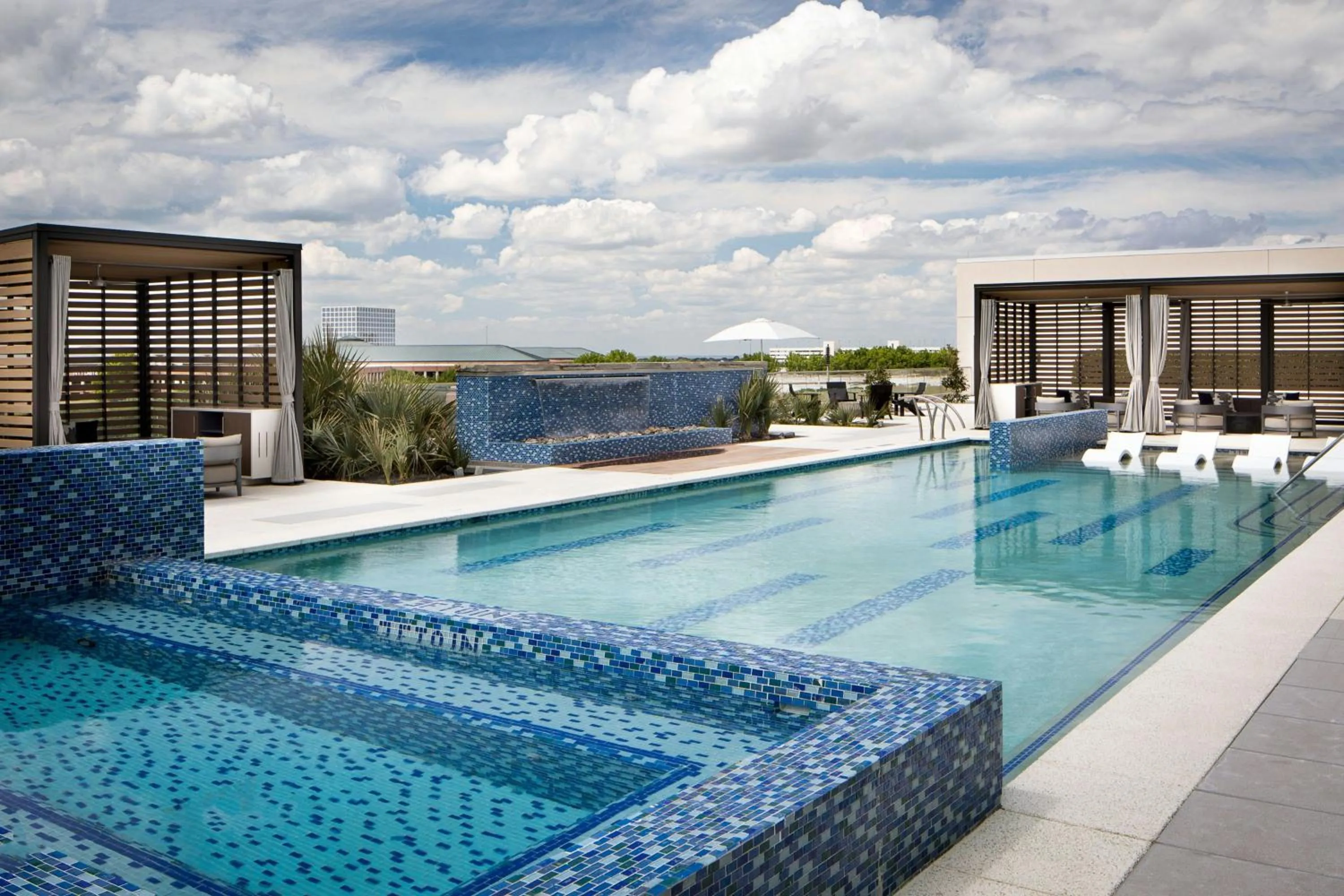 Swimming pool in Renaissance Dallas at Plano Legacy West Hotel