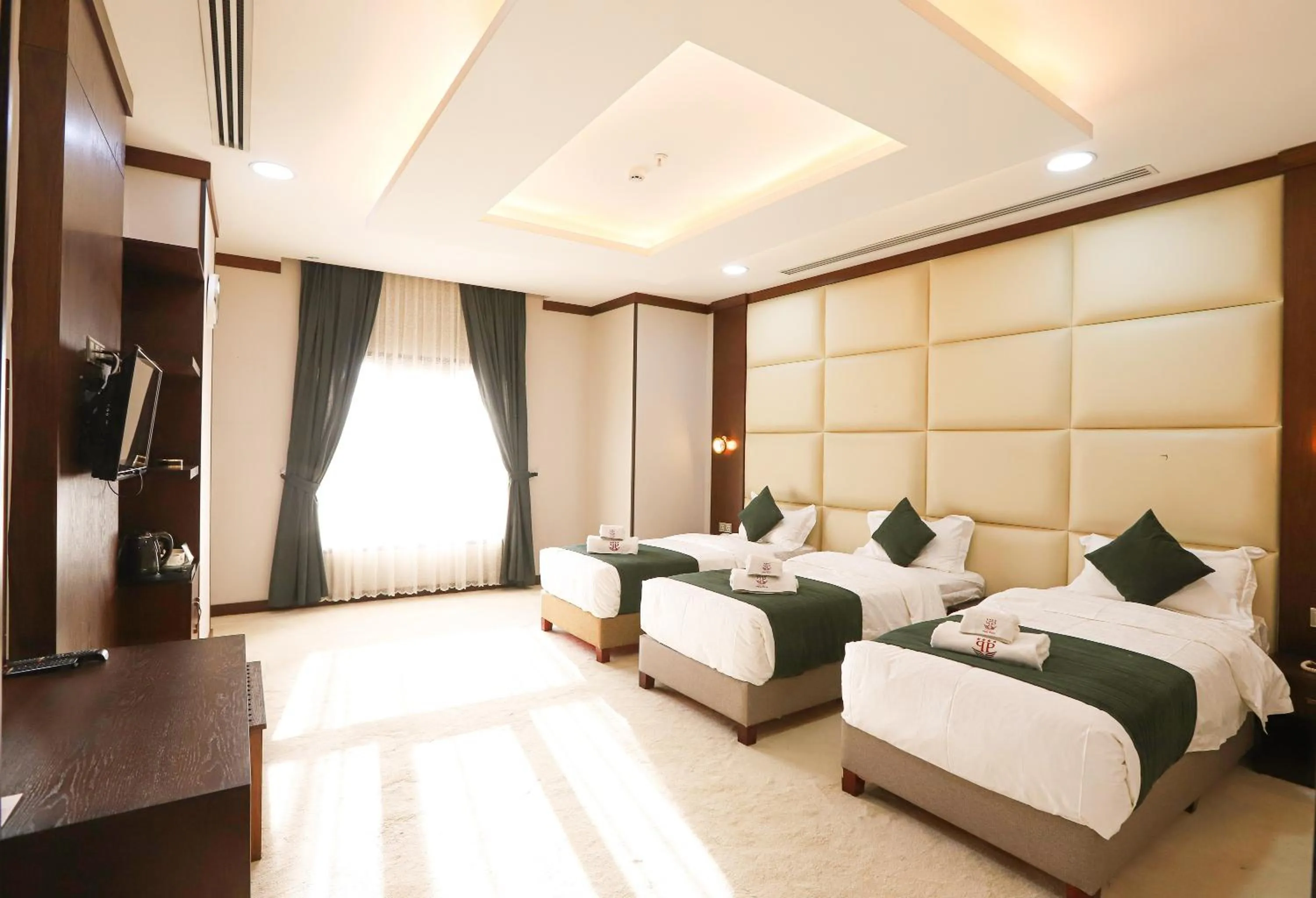 Bed in Paris Plaza Hotel