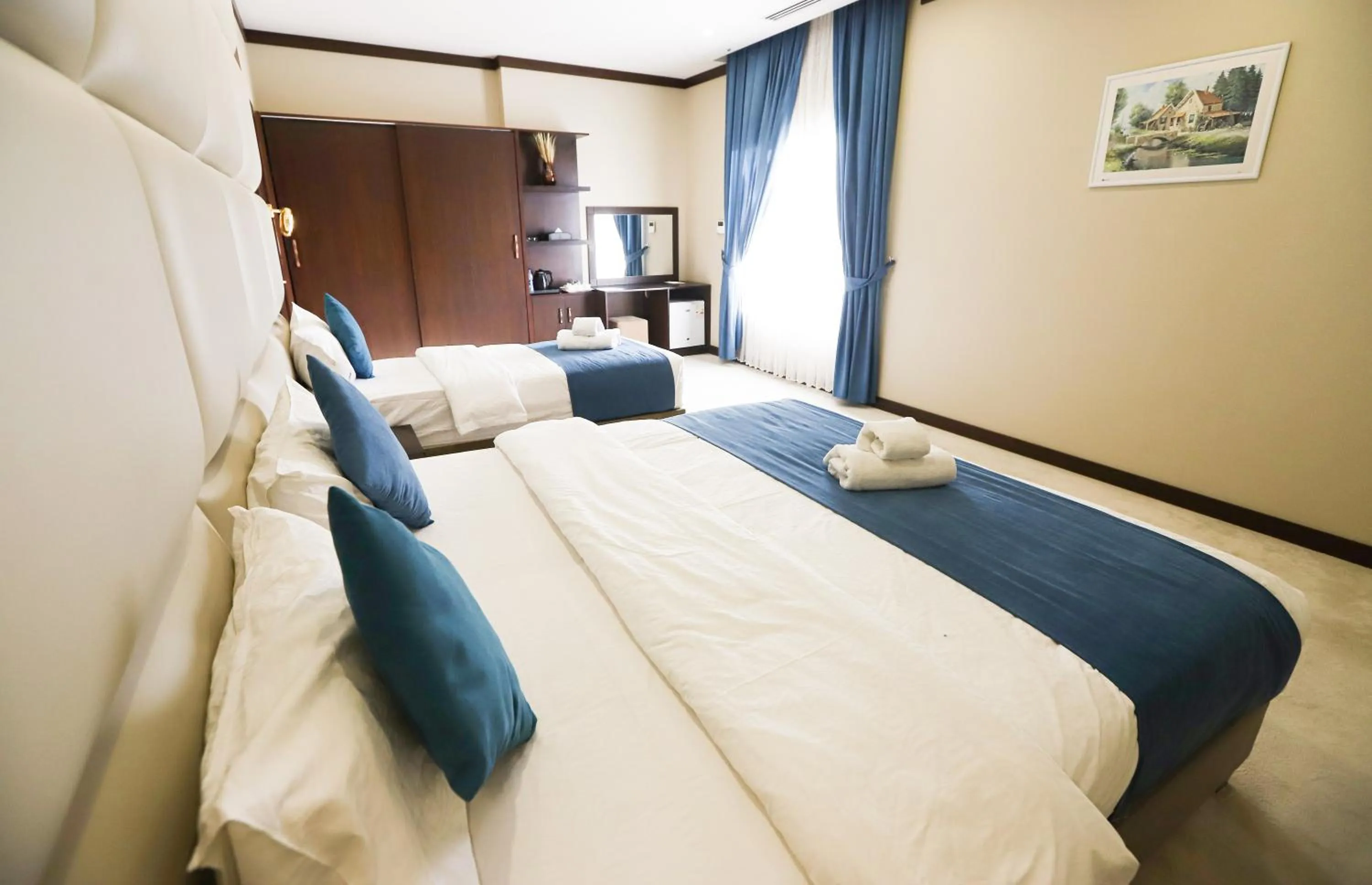 Bed in Paris Plaza Hotel