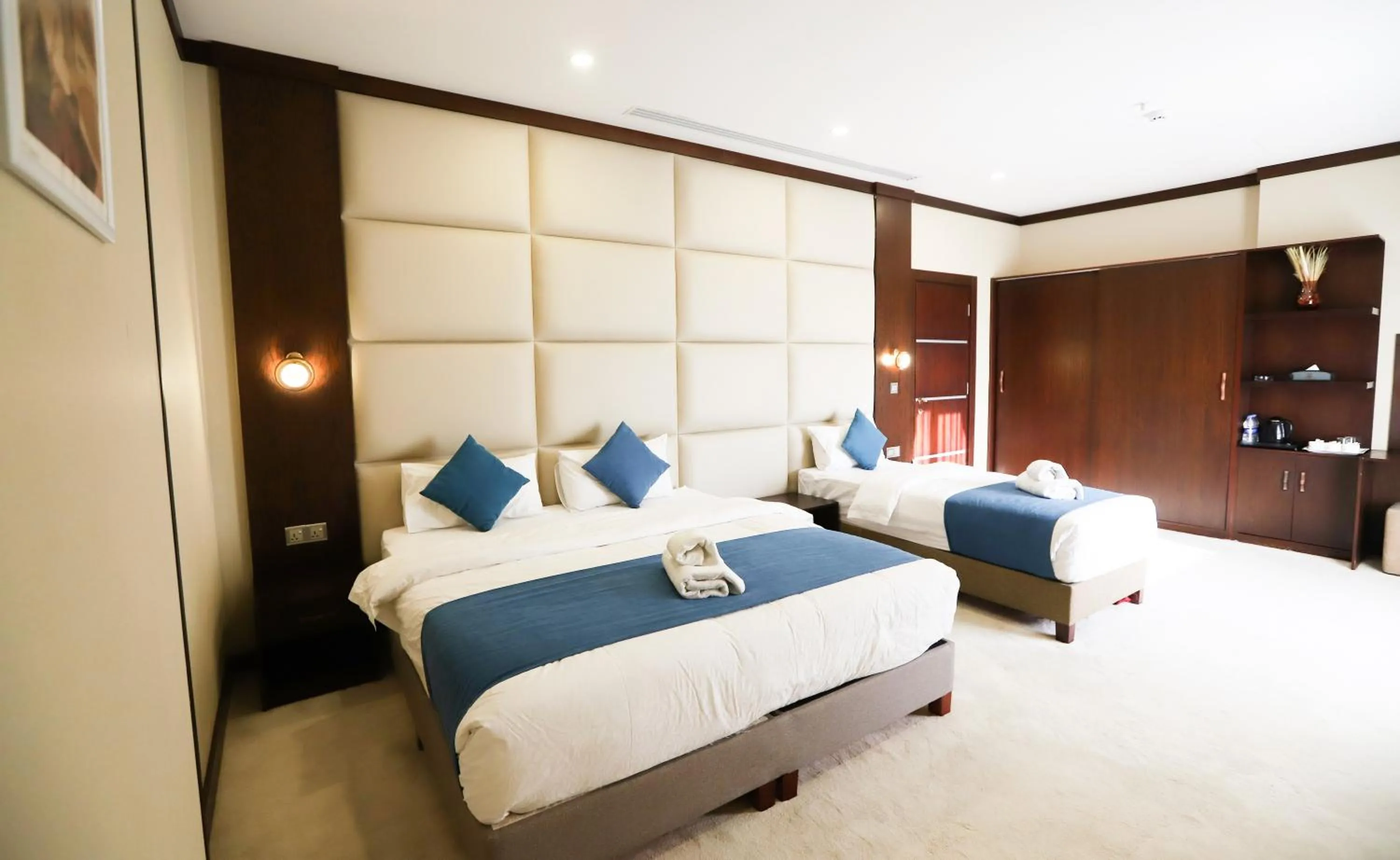 Bed in Paris Plaza Hotel