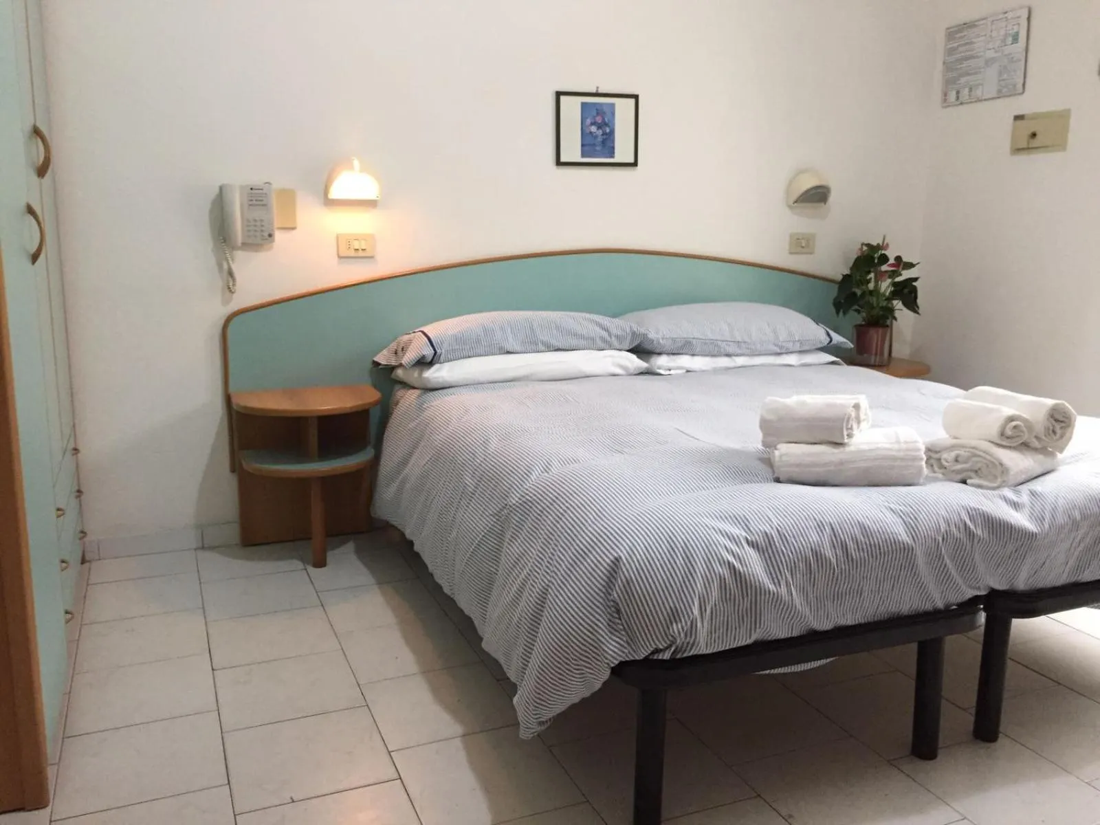 Bed in Hotel Riziana