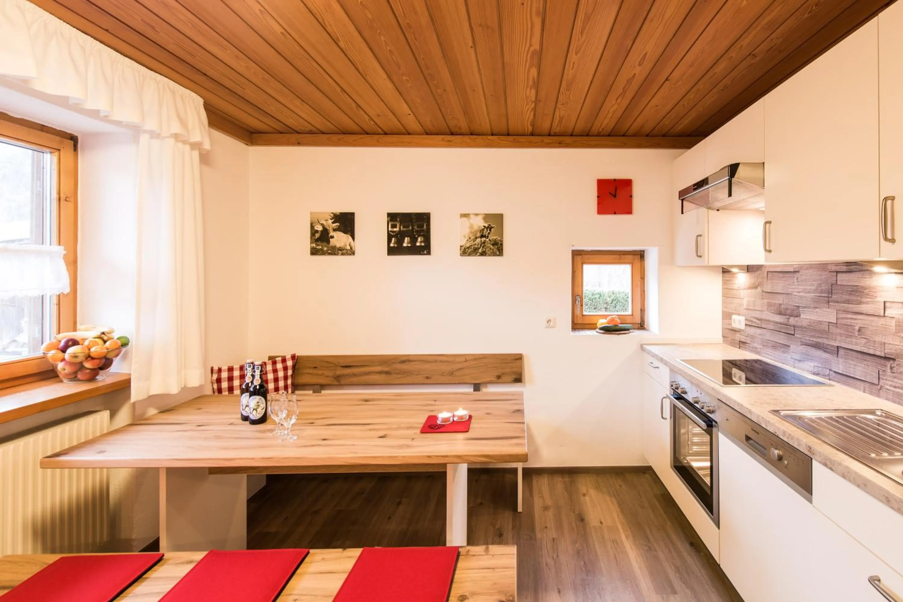 Kitchen or kitchenette in Ferienwohnungen Alpentraum - Landhaus am Bächle