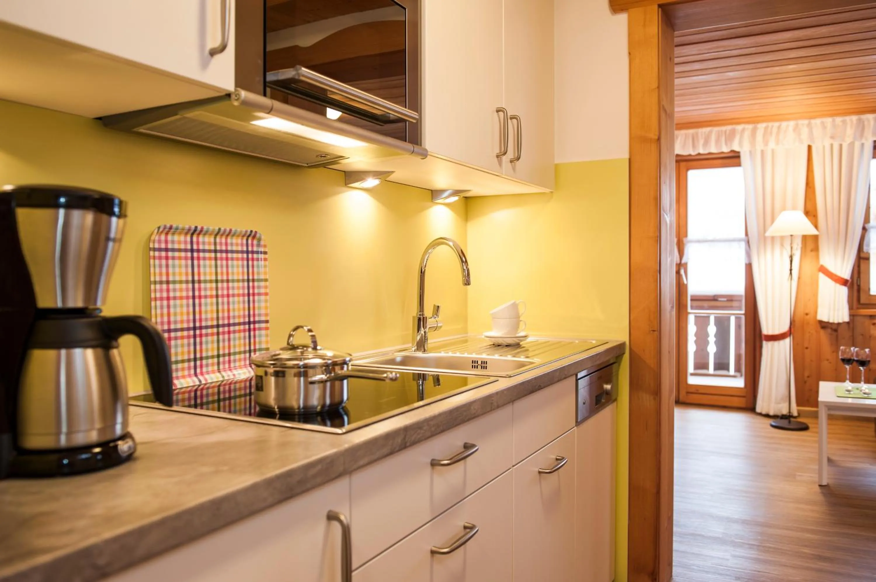 Kitchen or kitchenette in Ferienwohnungen Alpentraum - Landhaus am Bächle