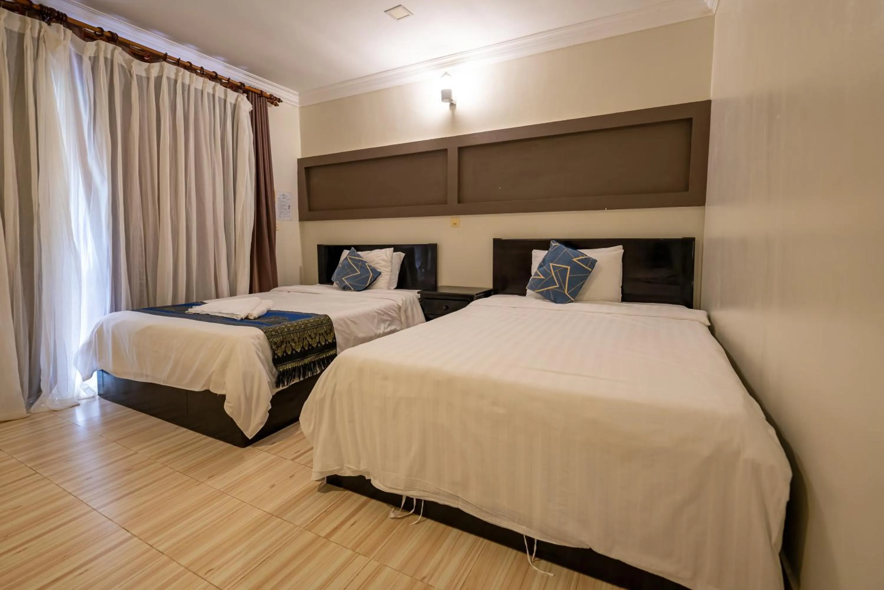 Bed in Hello Kampot Resort