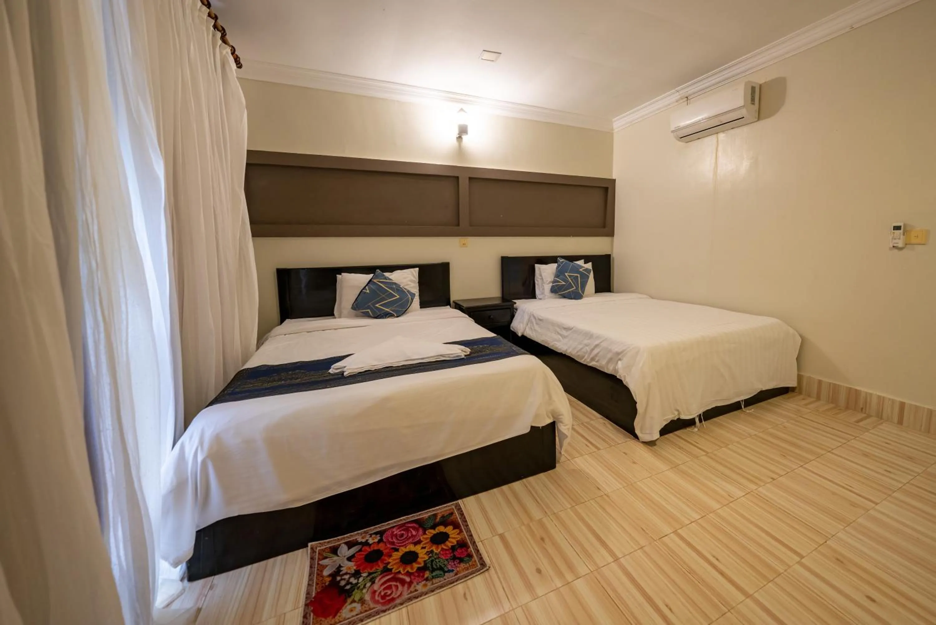 Bed in Hello Kampot Resort