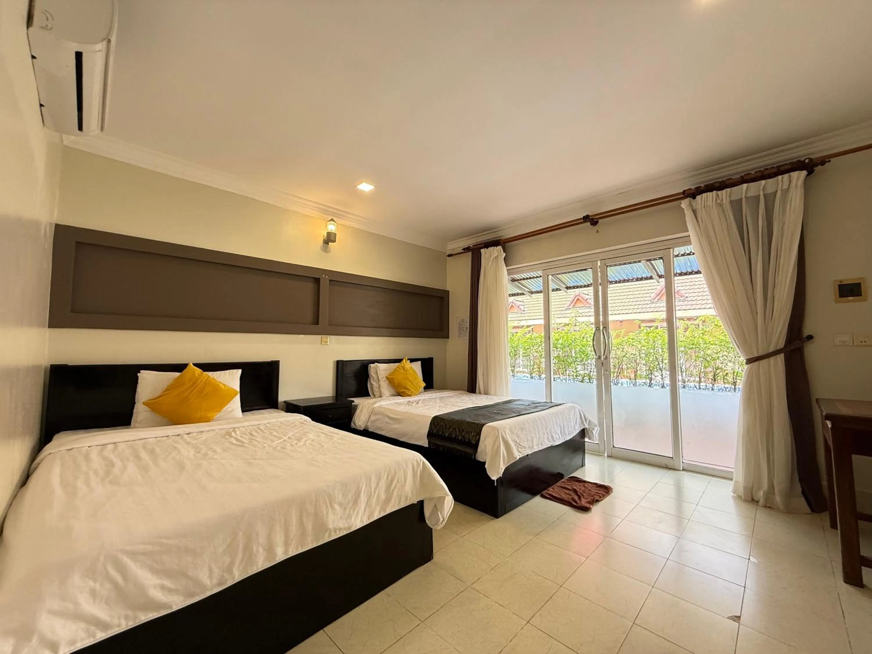Bed in Hello Kampot Resort
