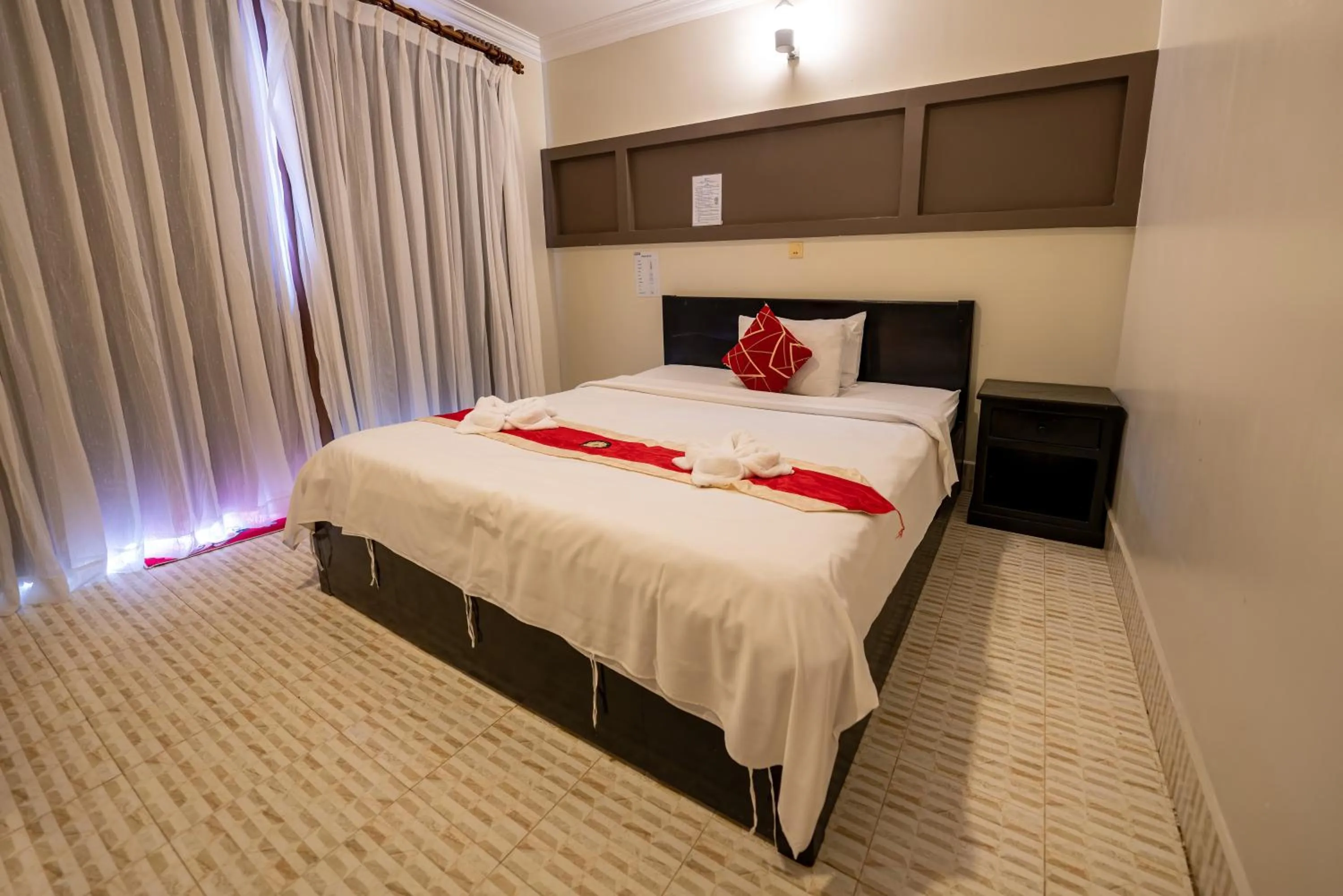 Bed in Hello Kampot Resort