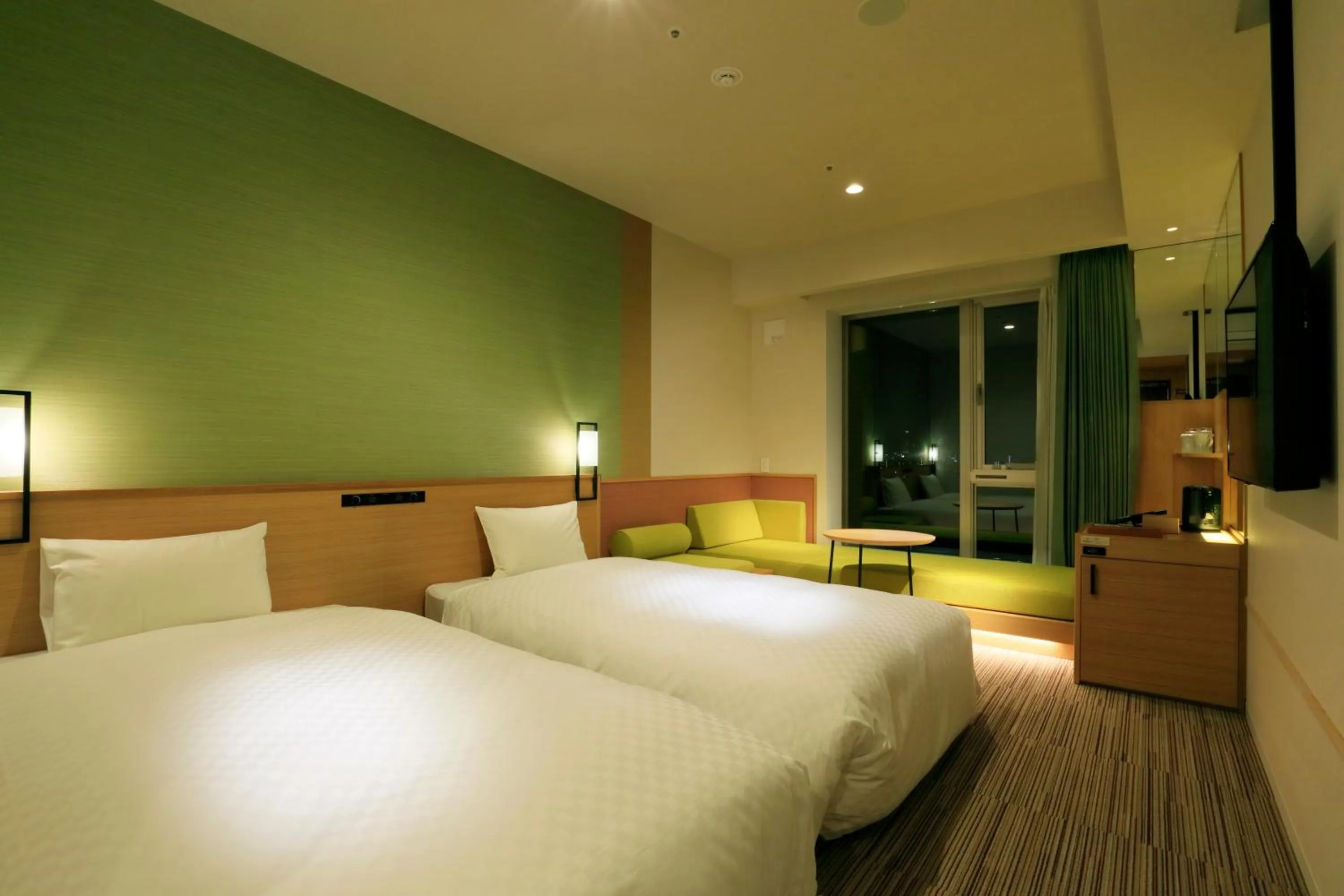 Photo of the whole room, Bed in THE SINGULARI HOTEL & SKYSPA at UNIVERSAL STUDIOS JAPAN