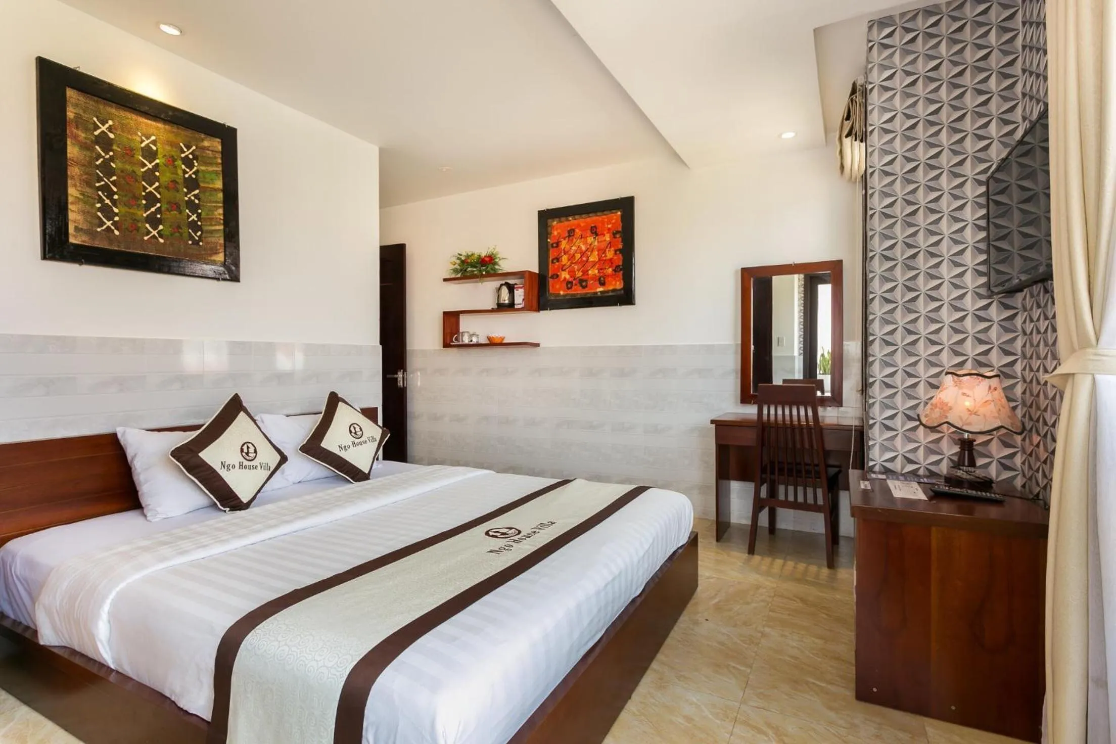 Bed in Ngo House Villa