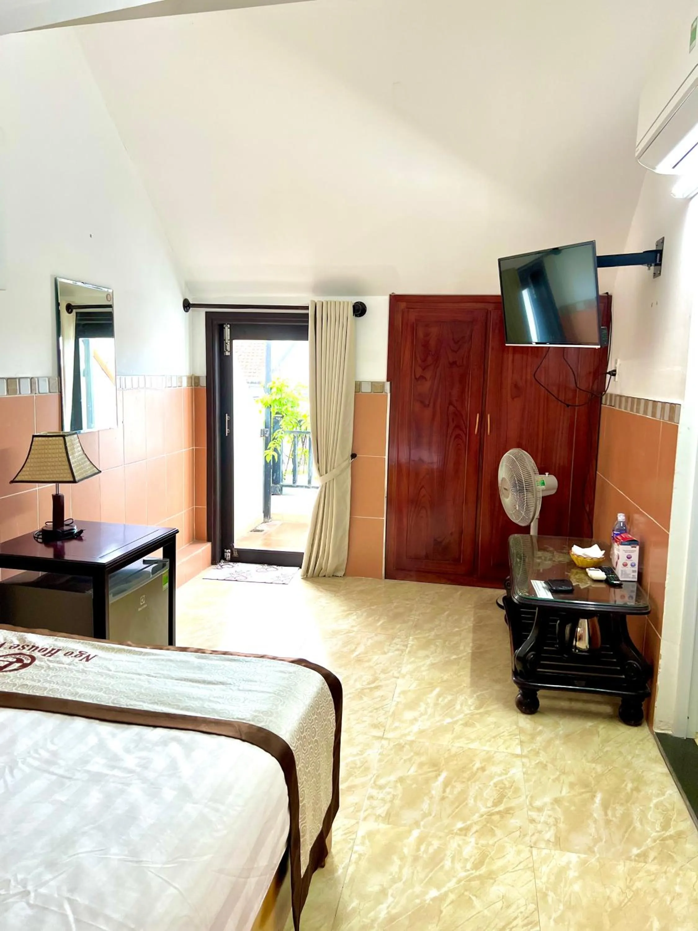 Bed in Ngo House Villa