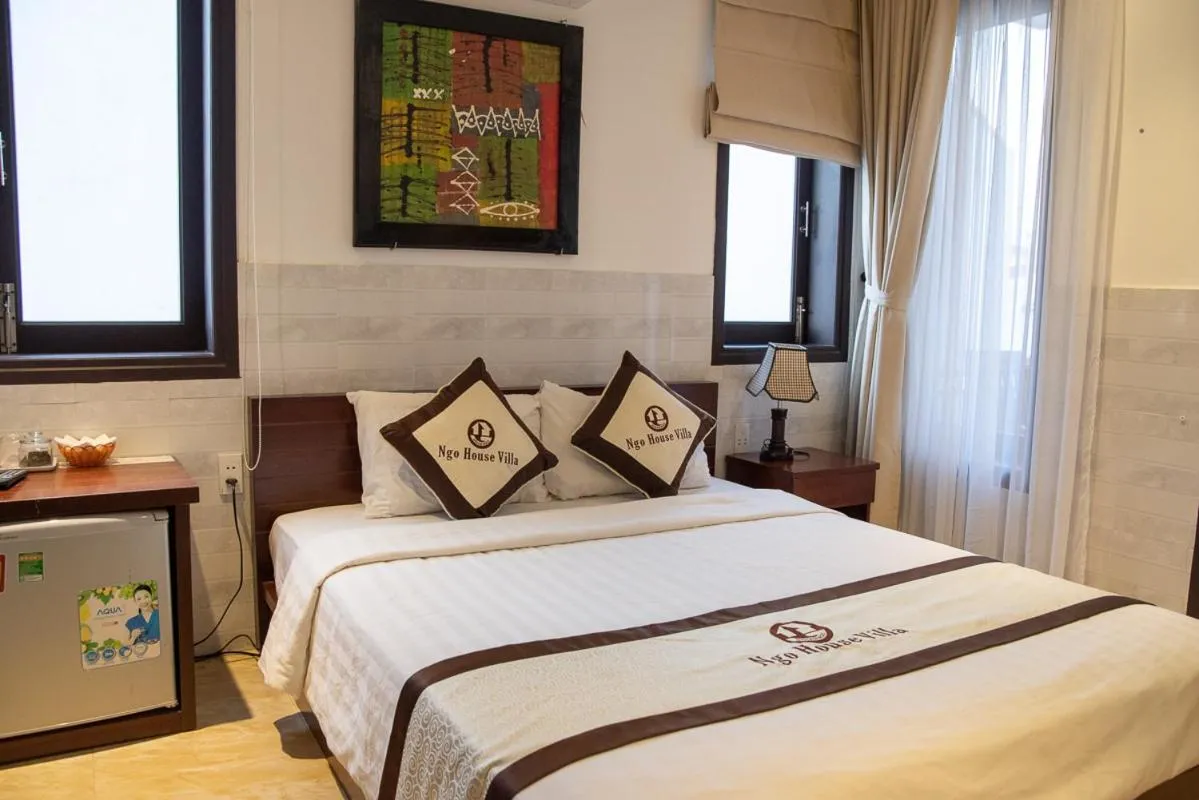 Bed in Ngo House Villa