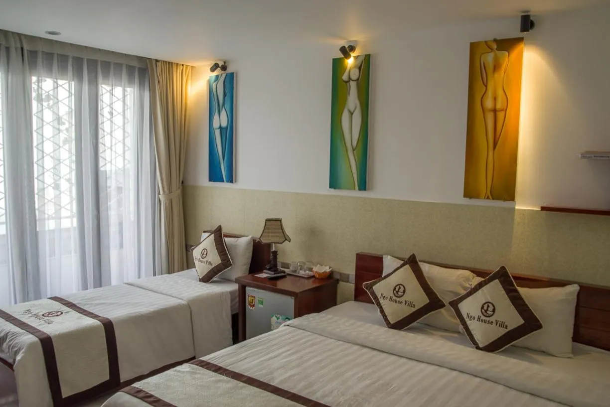 Bed in Ngo House Villa