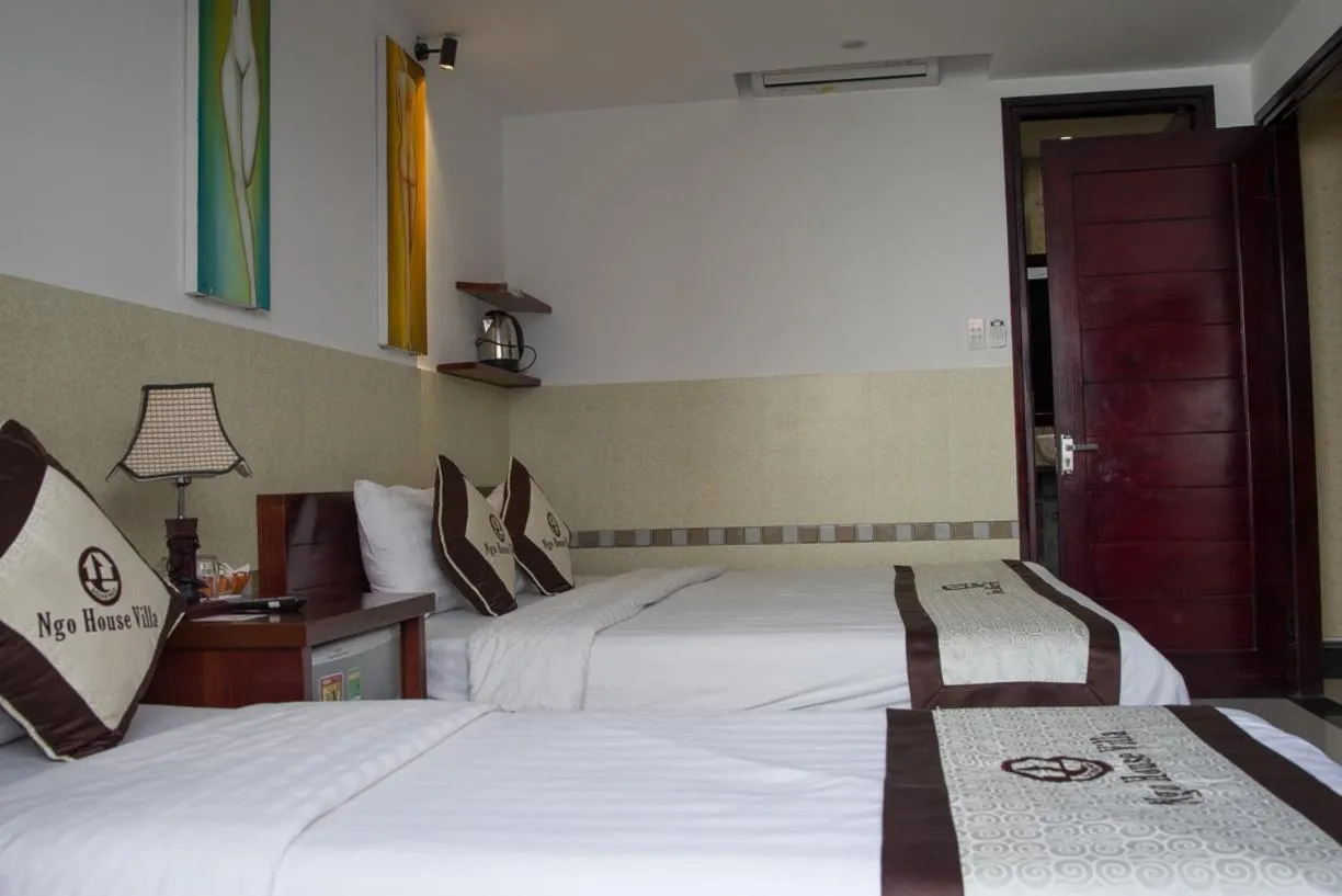 Bed in Ngo House Villa