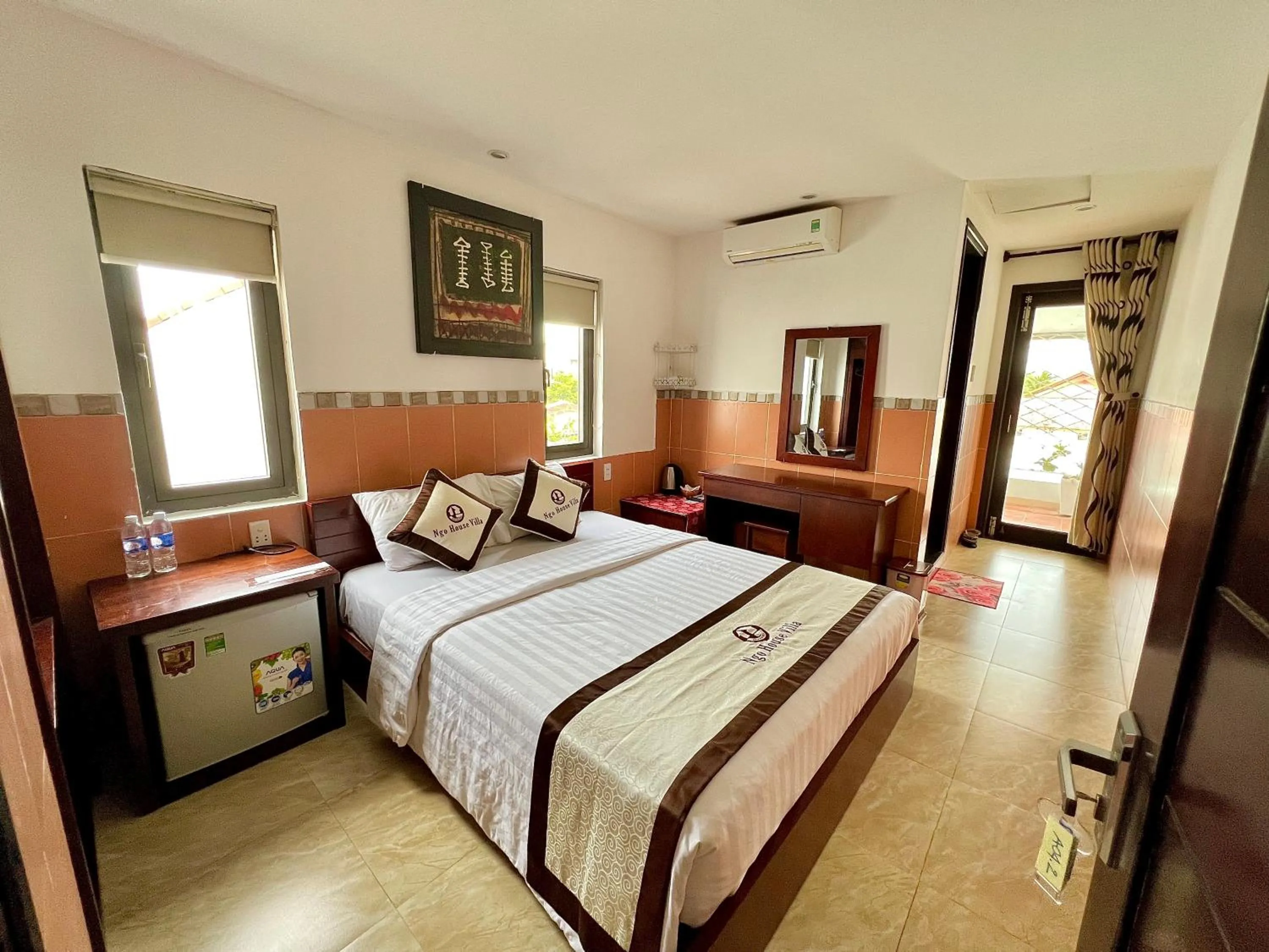 Bed in Ngo House Villa